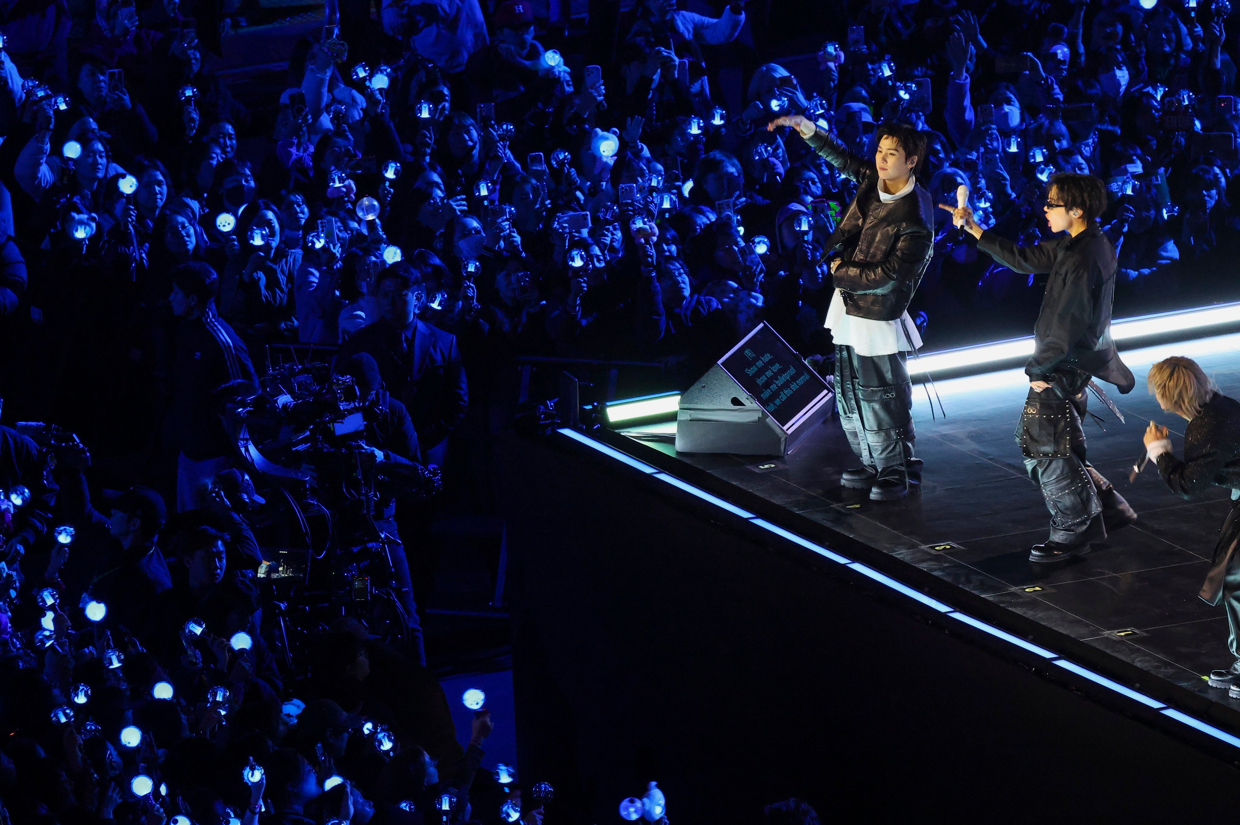 Members of K-pop group BTS perform during their comeback concert in Seoul, South Korea, on Saturday. Photo: EPA