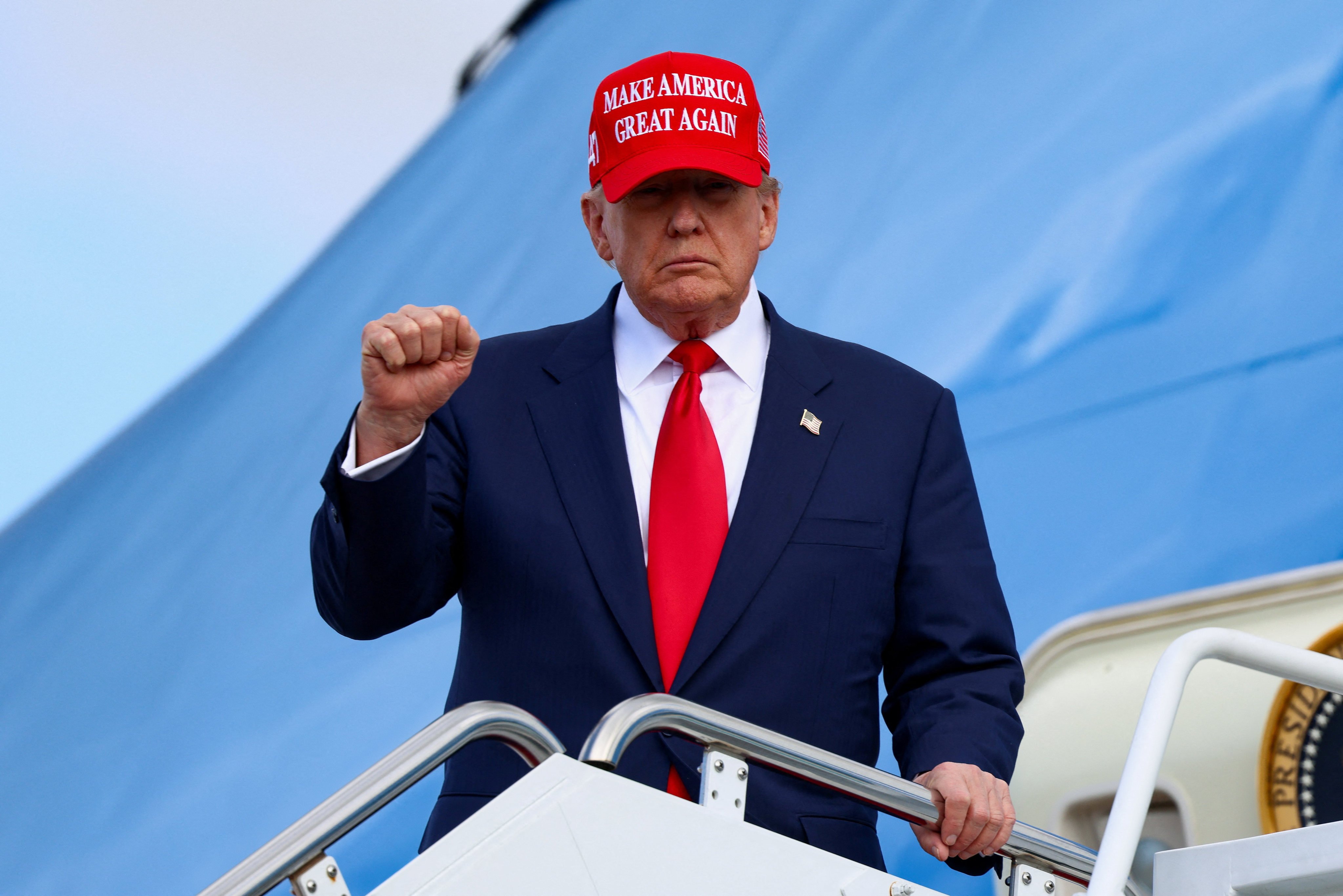 US President Donald Trump gestures as he disembarks from Air Force One at Joint Base Andrews in Maryland, on October 30, 2025. Photo: Reuters