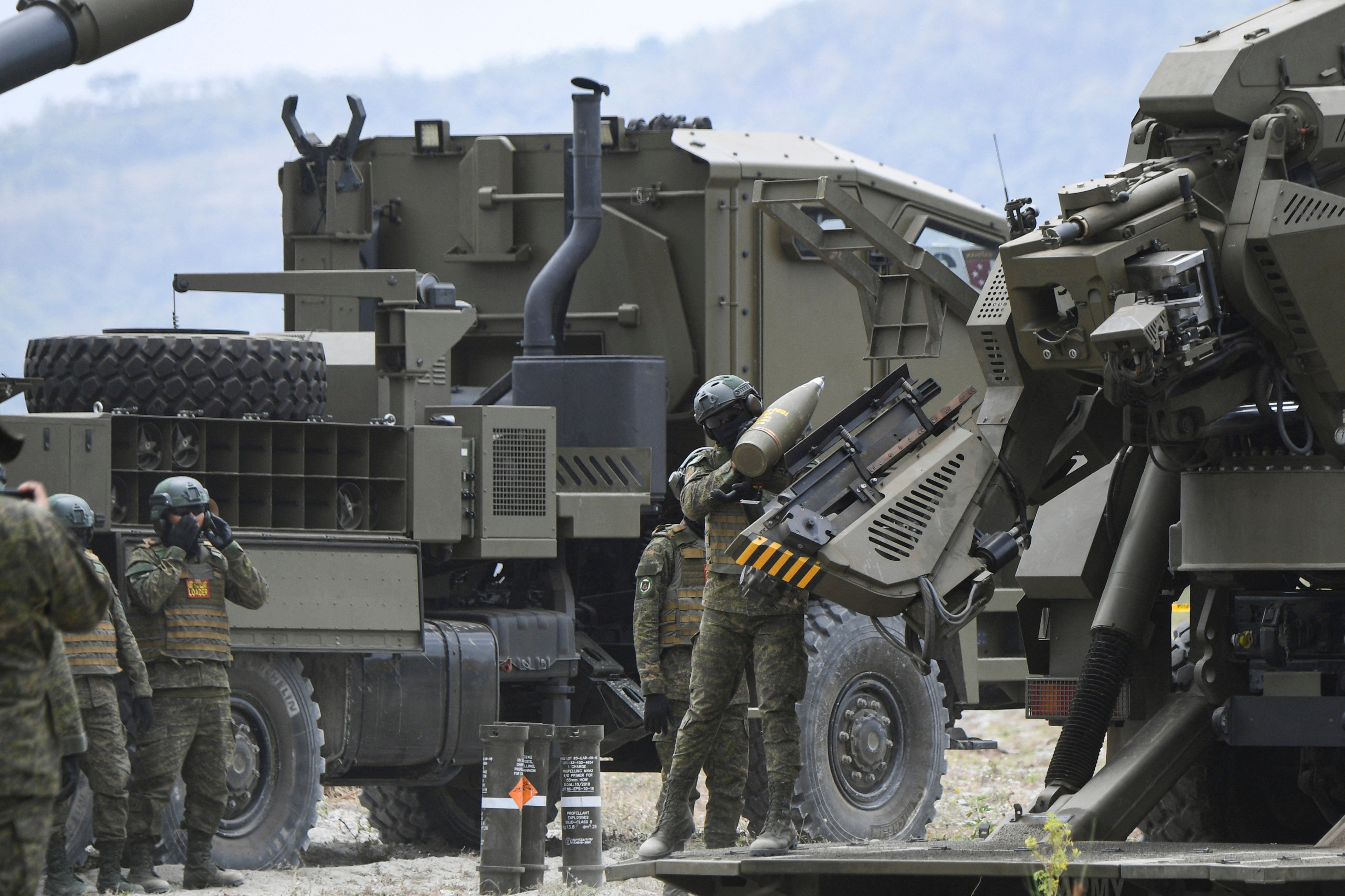 Philippine soldiers load ammunition into an Autonomous Truck Mounted Howitzer System (Armos) during a live-fire exercise in 2024. Photo: AFP