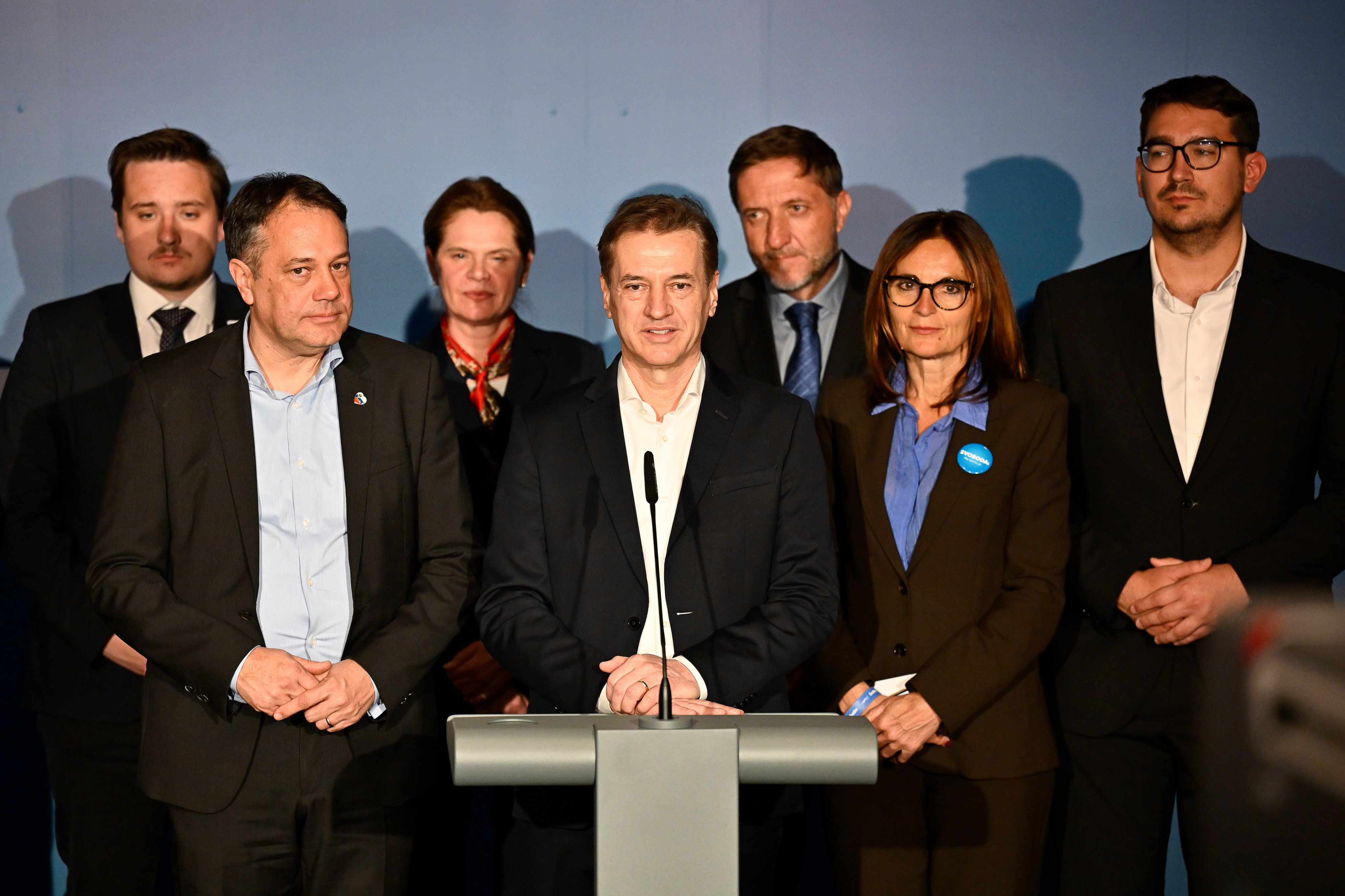 Prime Minister of Slovenia Robert Golob, middle, addresses the media at the parliament in Ljubljana on Sunday. Photo: AP