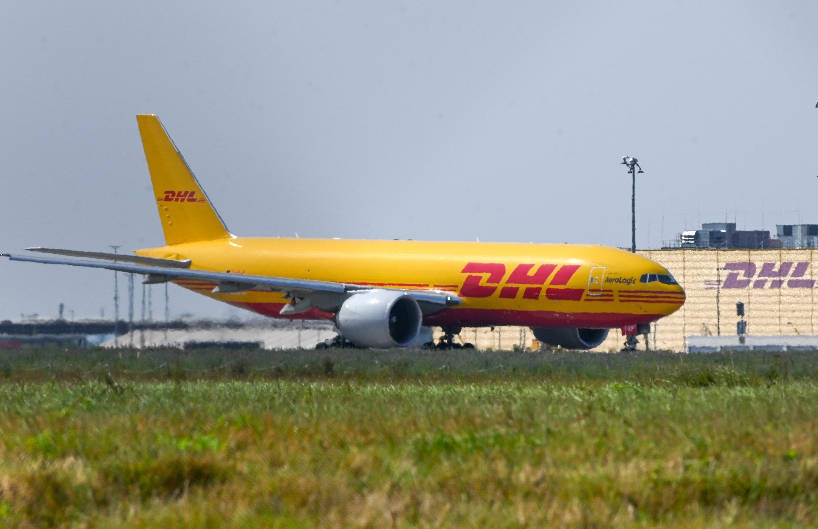 A DHL aircraft stands in front of the DHL Air Hub at the Leipzig/Halle Airport in Germany. Photo: dpa