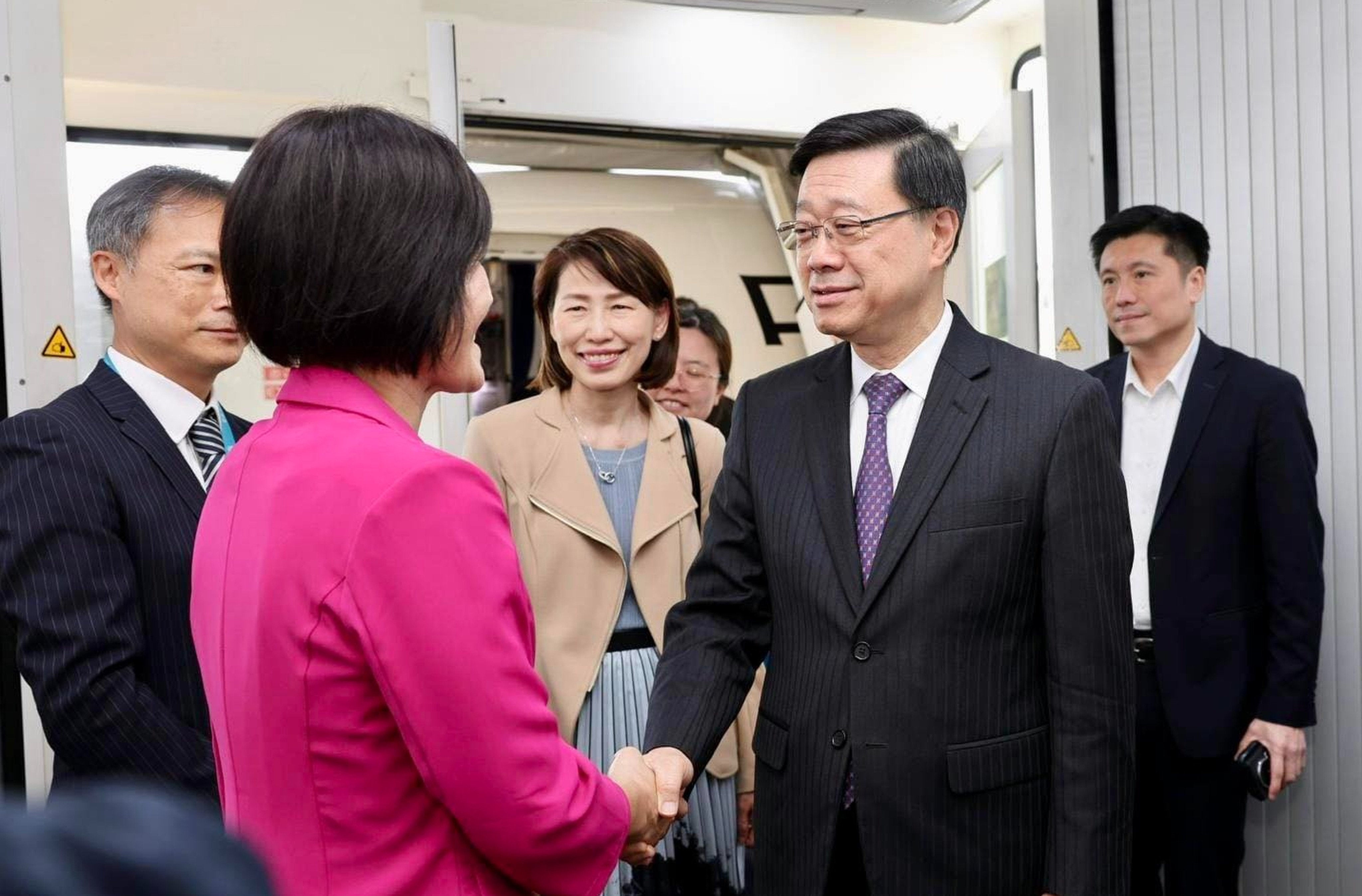 Hong Kong leader John Lee arrives in Haikou, Hainan. Photo: Handout
