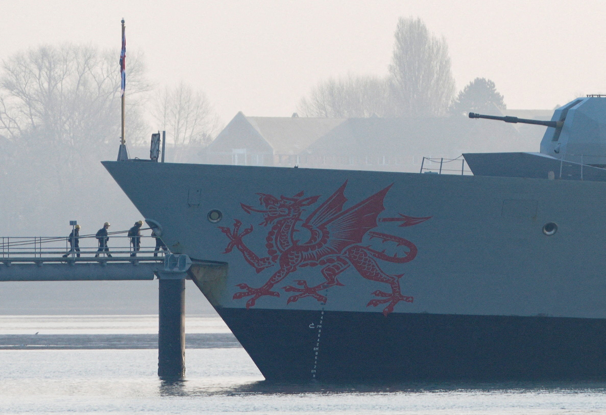 Crew members board the HMS Dragon in Portsmouth Harbour on March 4. The British warship has arrived in the eastern Mediterranean to defend Cyprus. Photo: Reuters