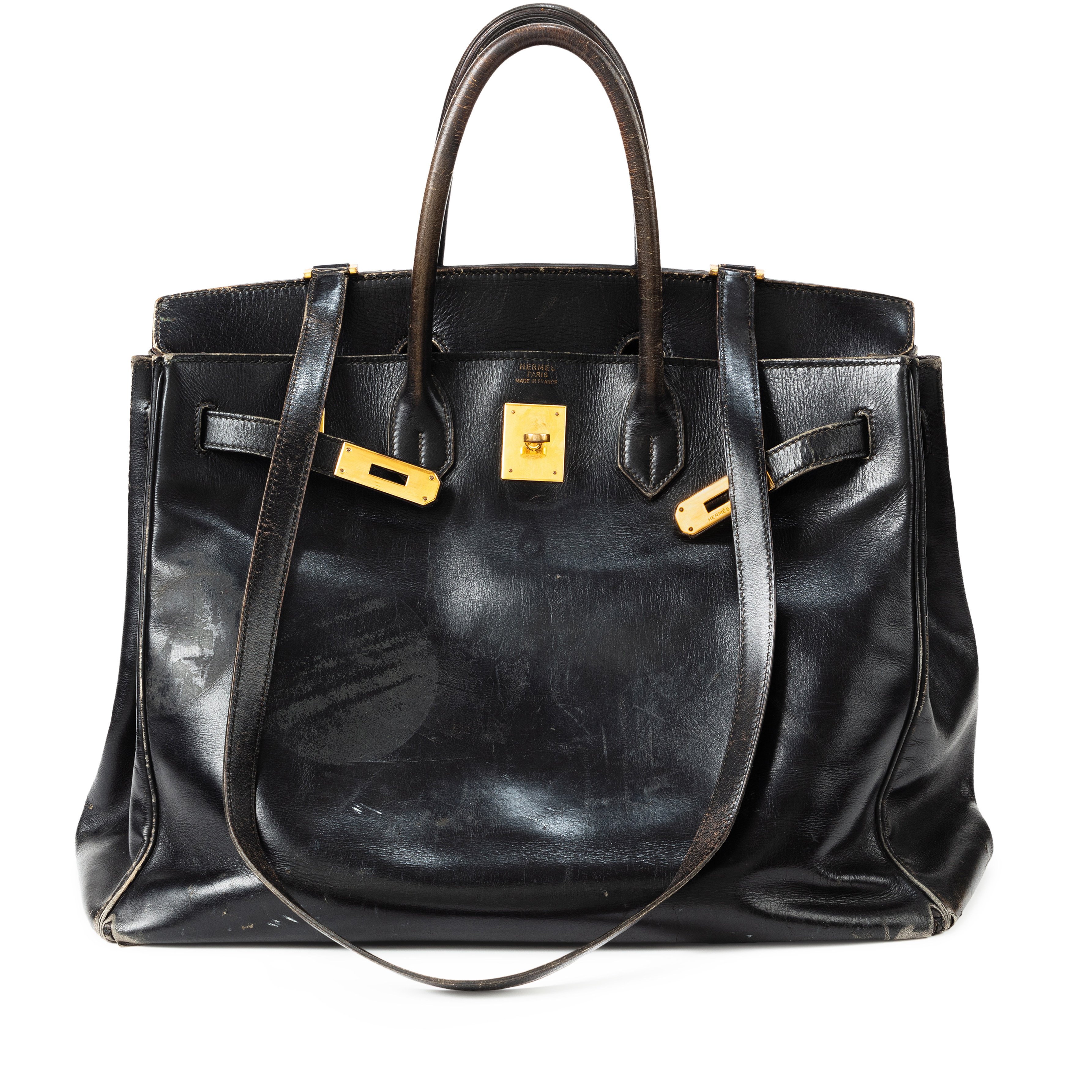 scmp.com - Annie Brown - Why worn-out designer handbags are the ultimate status symbols