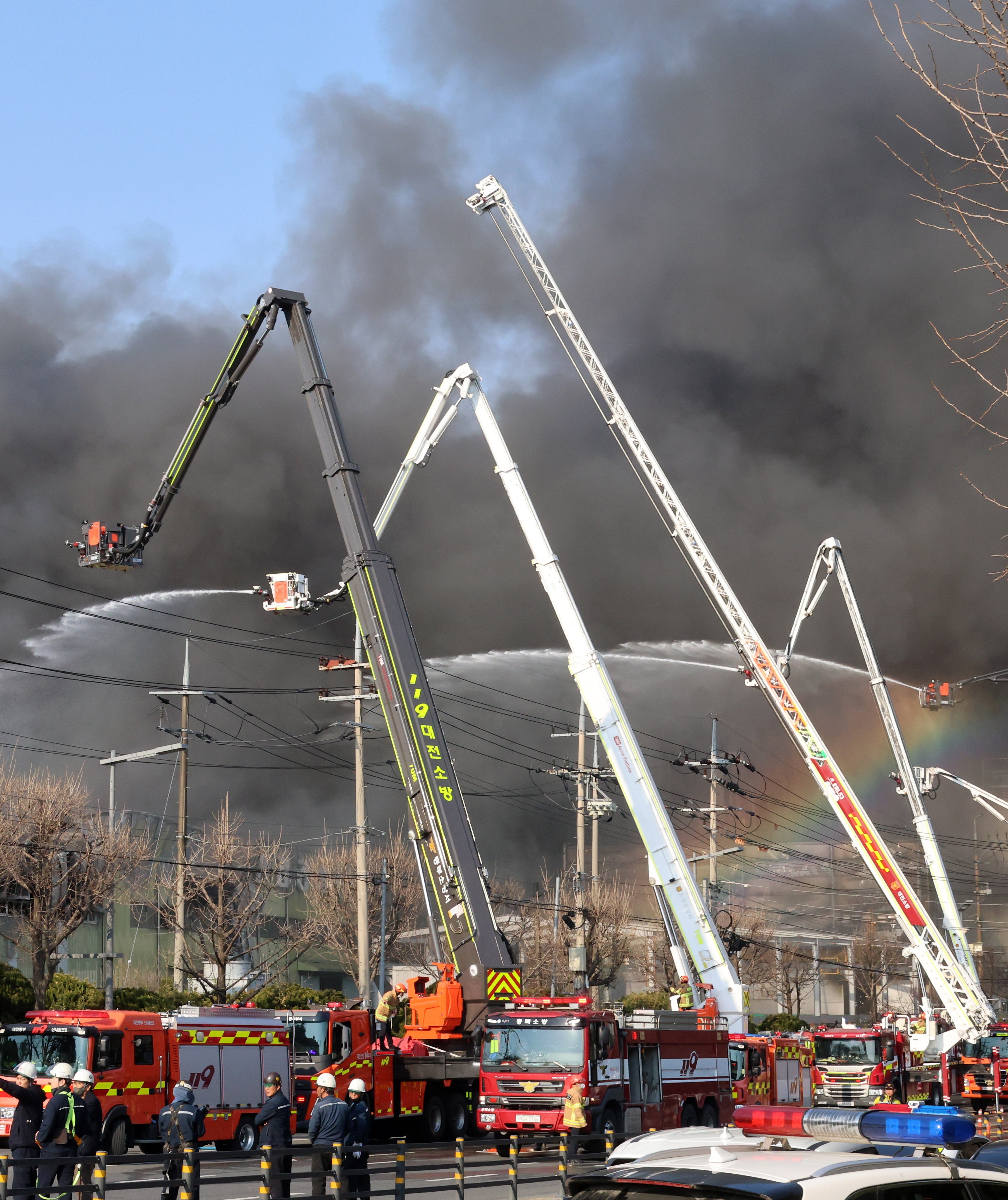Firefighters battle the blaze at the car parts plant in the central city of Daejeon, South Korea. Photo: EPA/Yonhap