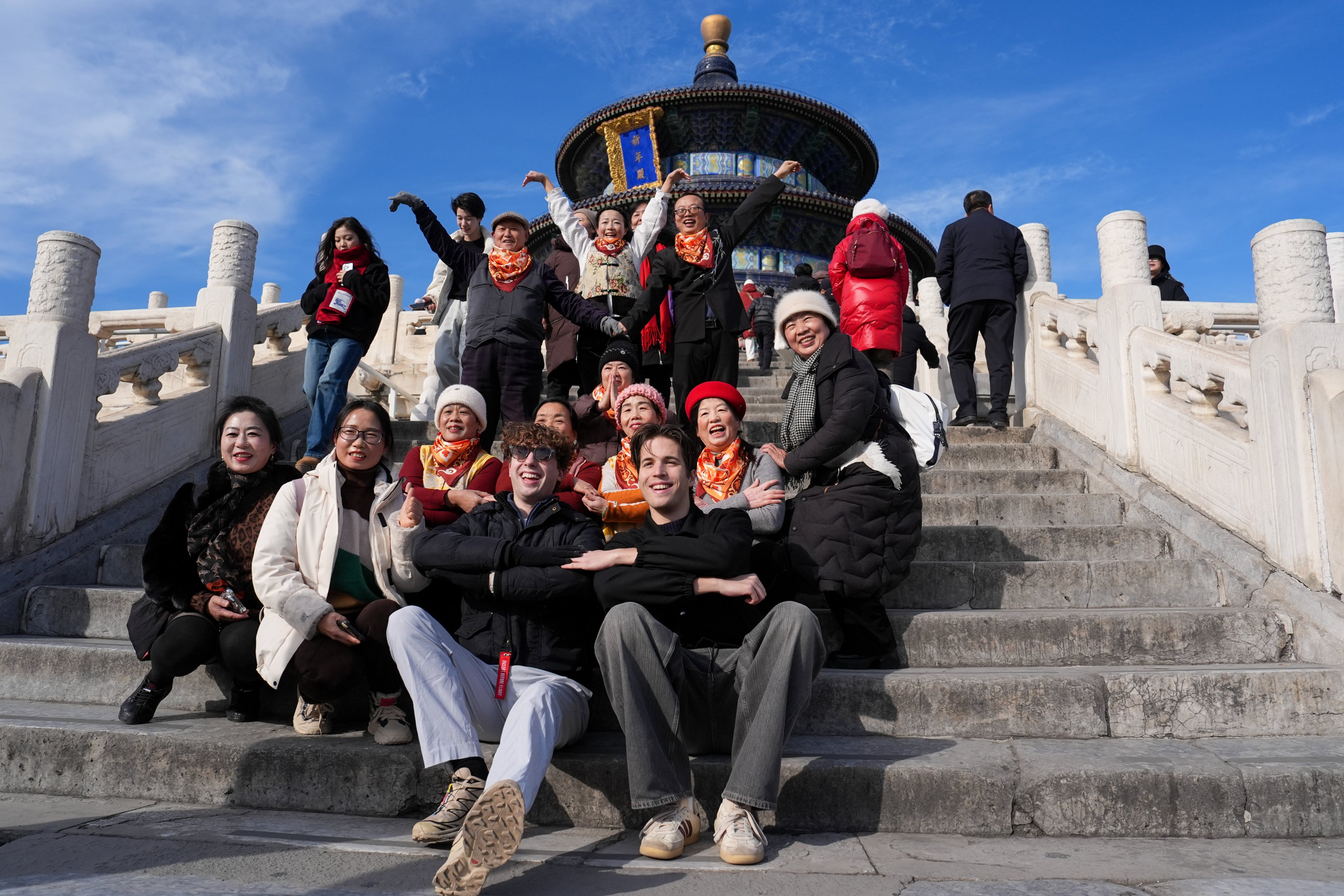 Tourists pose for photos at the Tiantan (Temple of Heaven) Park in Beijing. Photo: Xinhua
