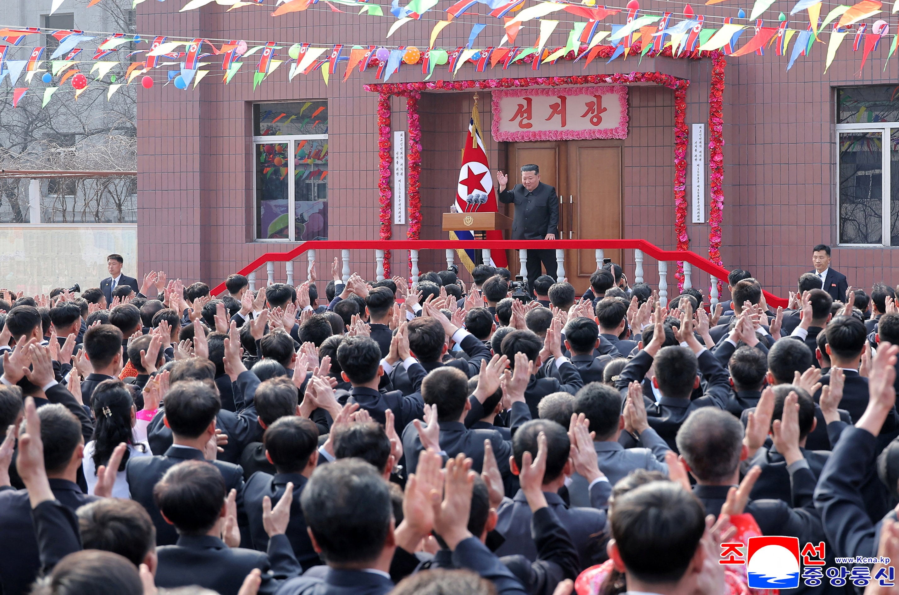 North Korean leader Kim Jong-un greets people during a visit to a coal mine run by young workers on March 15. Photo: KCNA via Reuters