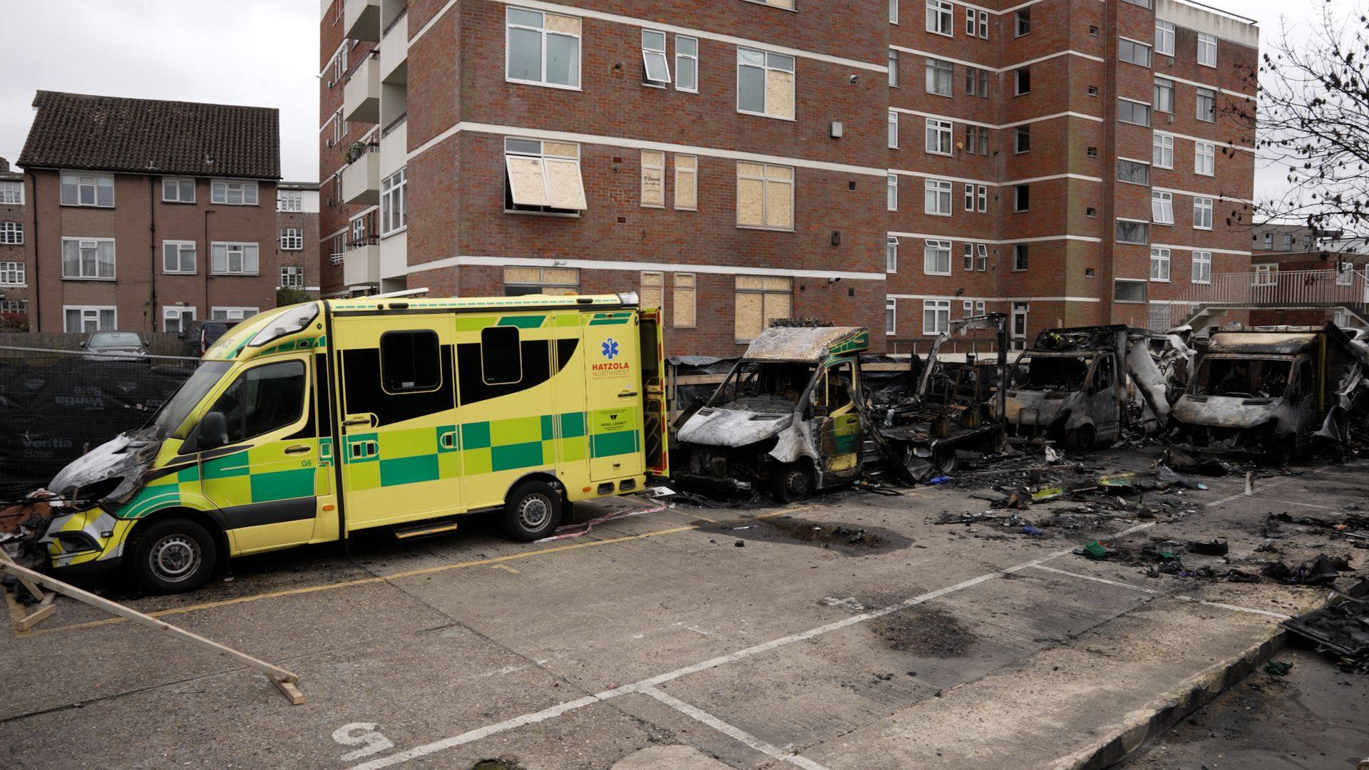 The burnt out remains of Hatzola ambulances at the Jewish Community Ambulance service in Golders Green, after an apparent arson attack on four ambulances on Monday. Photo: dpa