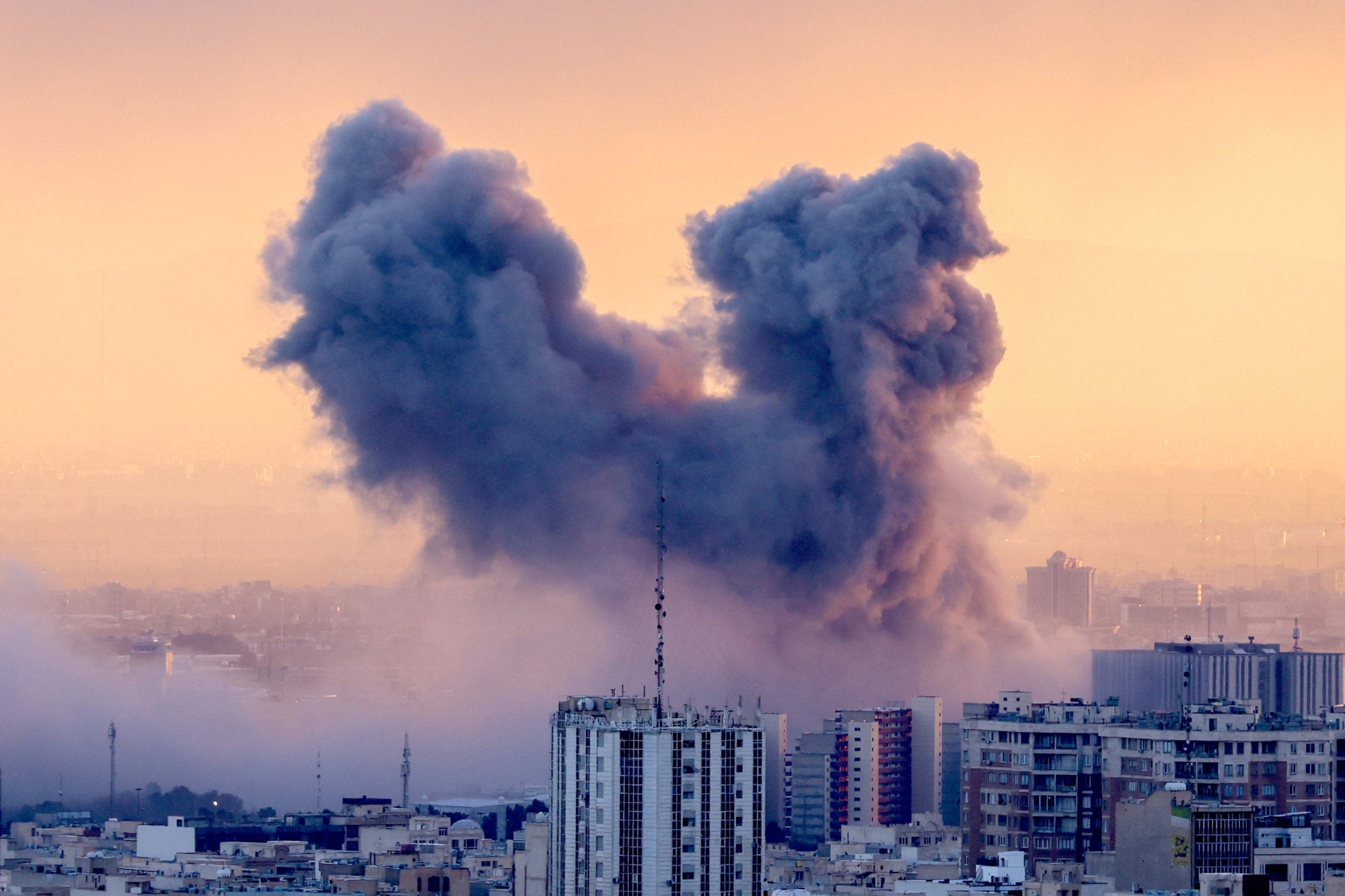 A plume of smoke rises after a strike on the Iranian capital Tehran earlier this month. Photo: AFP/Getty Images/TNS A plume of smoke rises after a strike on the Iranian capital Tehran earlier this month. Photo: AFP/Getty Images/TNS