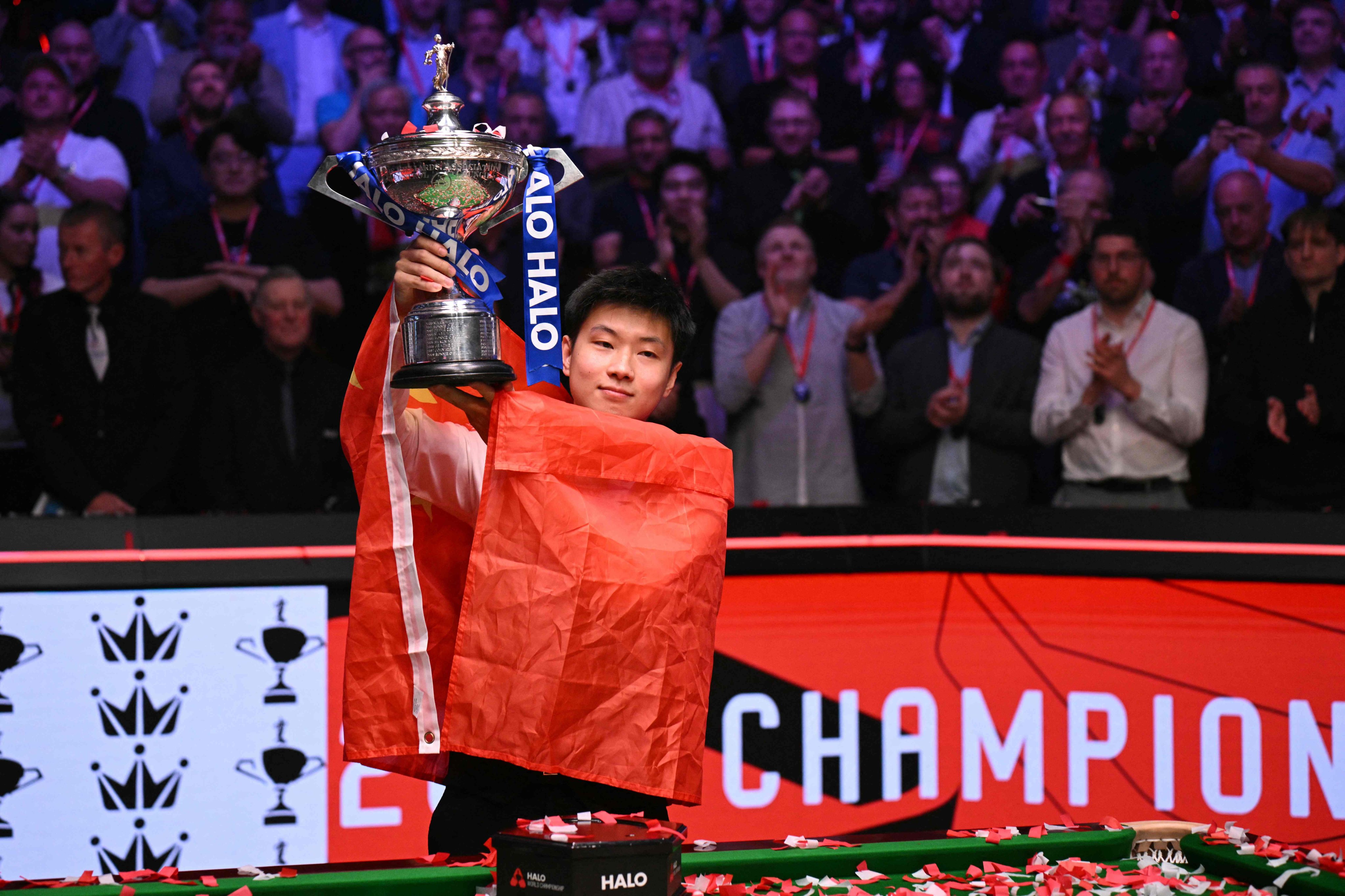 Reigning world champion Zhao Xintong became the first Chinese player to win the title at the Crucible. Photo: AFP