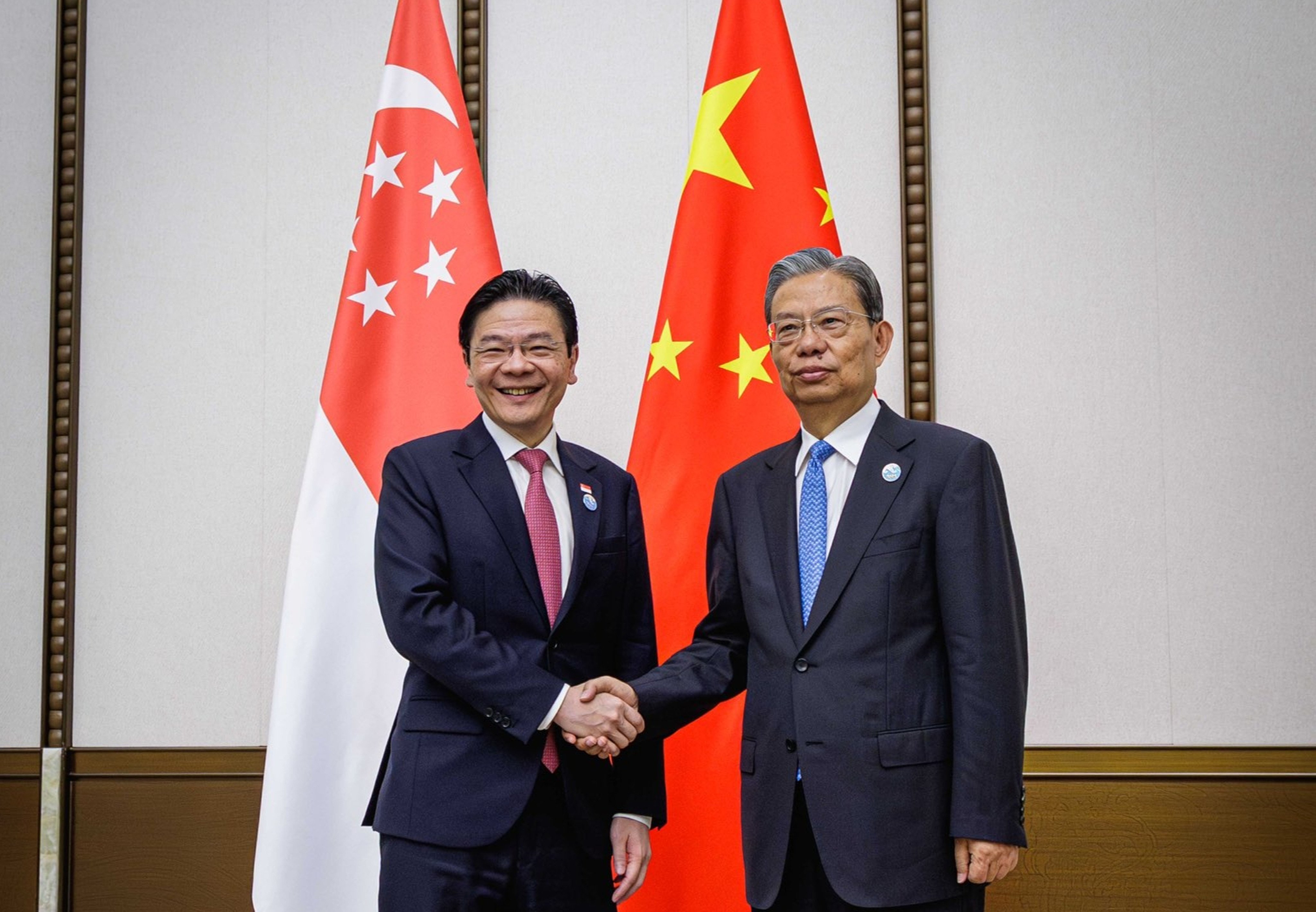 Singaporean Prime Minister Lawrence Wong meets with National People’s Congress chairman Zhao Leji at the Boao Forum for Asia on Thursday. Photo: Handout