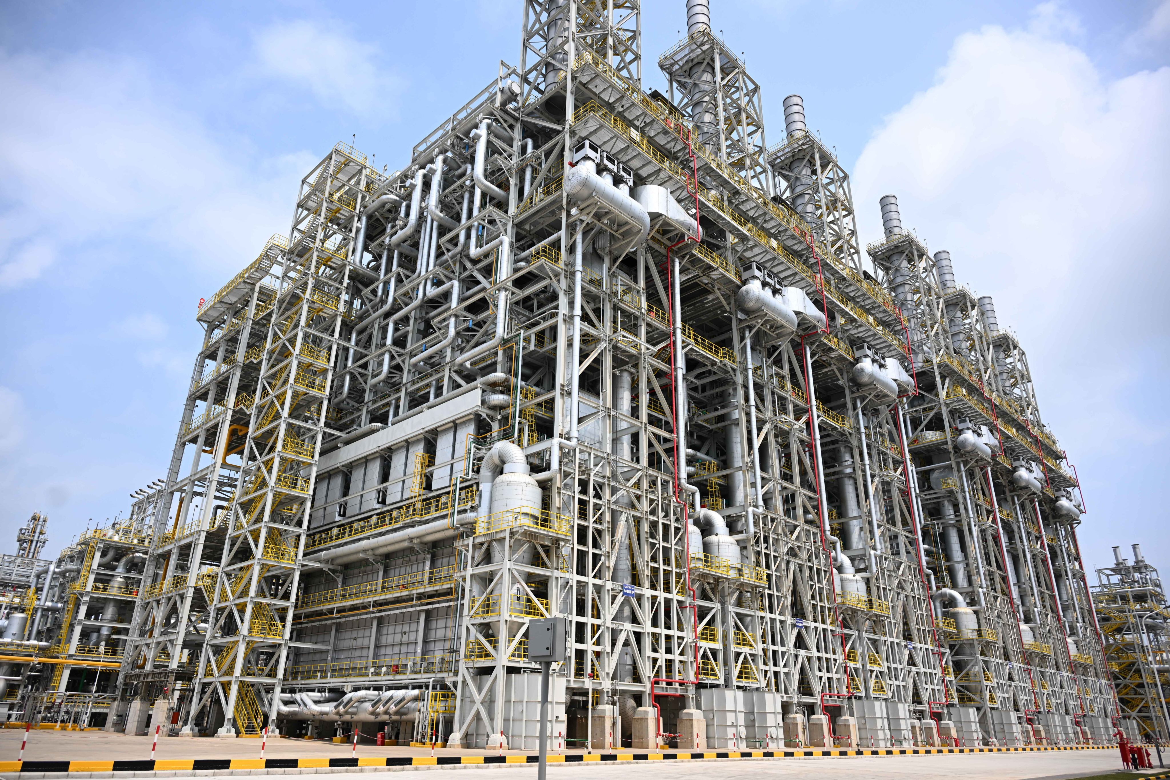 German chemicals giant BASF on Thursday put its massive production complex in Guangdong province into full operation, marking the largest single investment project wholly owned by a German enterprise in China. Photo: Xinhua