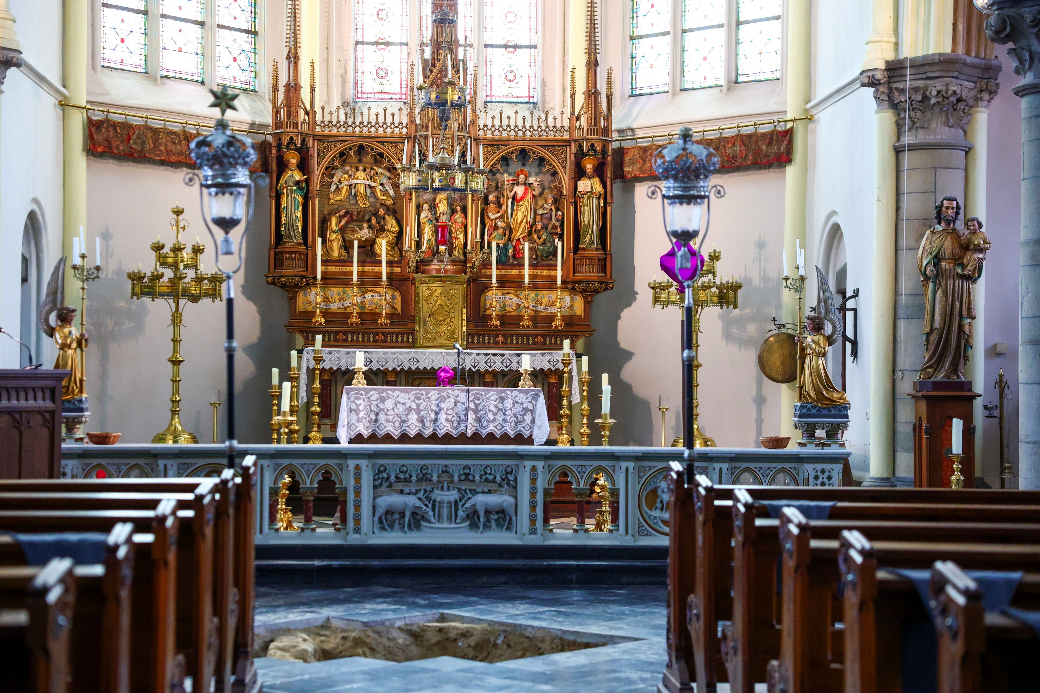 An excavation pit opened in the floor at the Peter and Paul Church in Maastricht, Netherlands, where archaeologists believe they may have uncovered the skeletal remains of musketeer d’Artagnan. Photo: Reuters