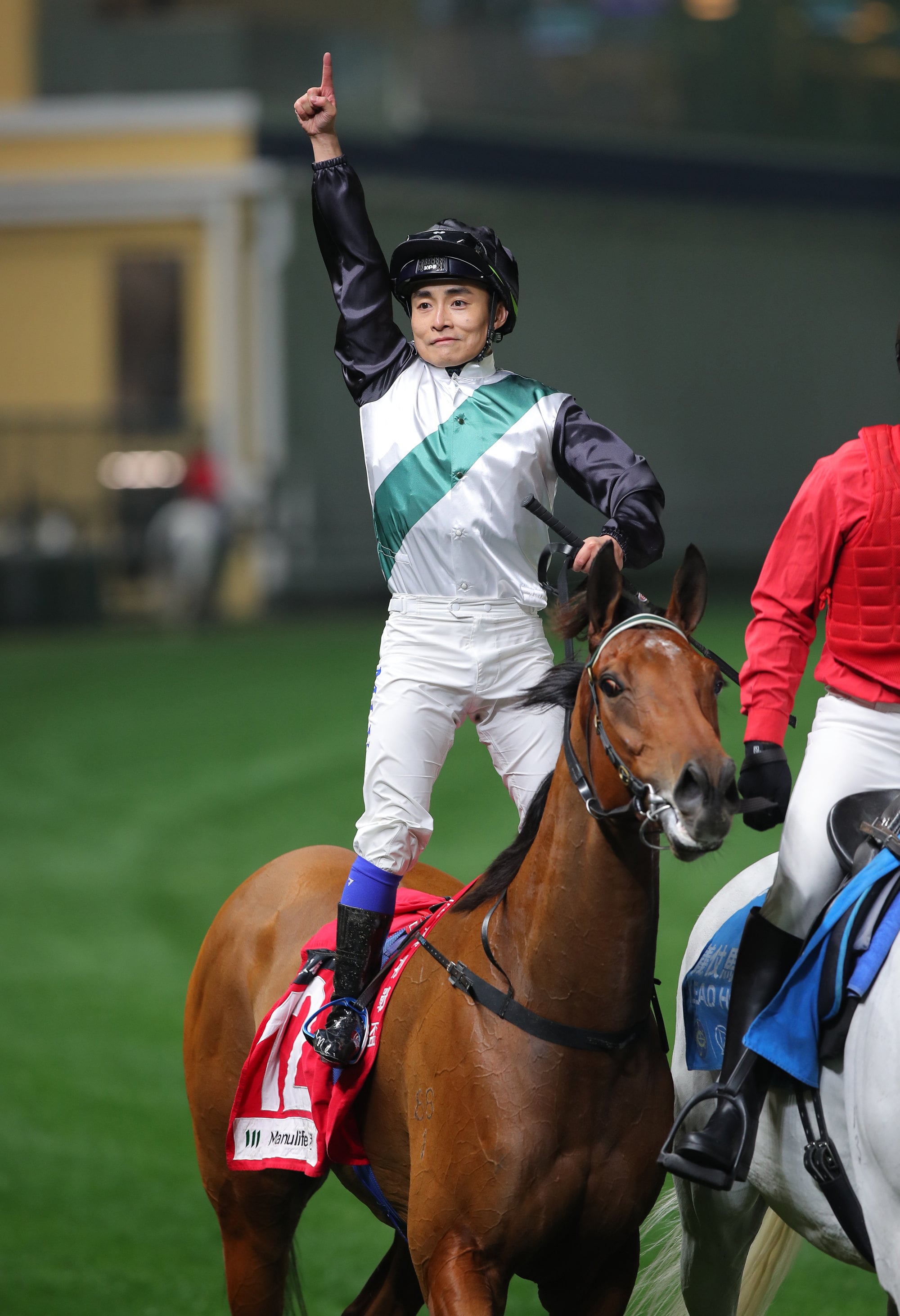Keith Yeung celebrates a recent victory aboard China Win. Keith Yeung celebrates a recent victory aboard China Win.