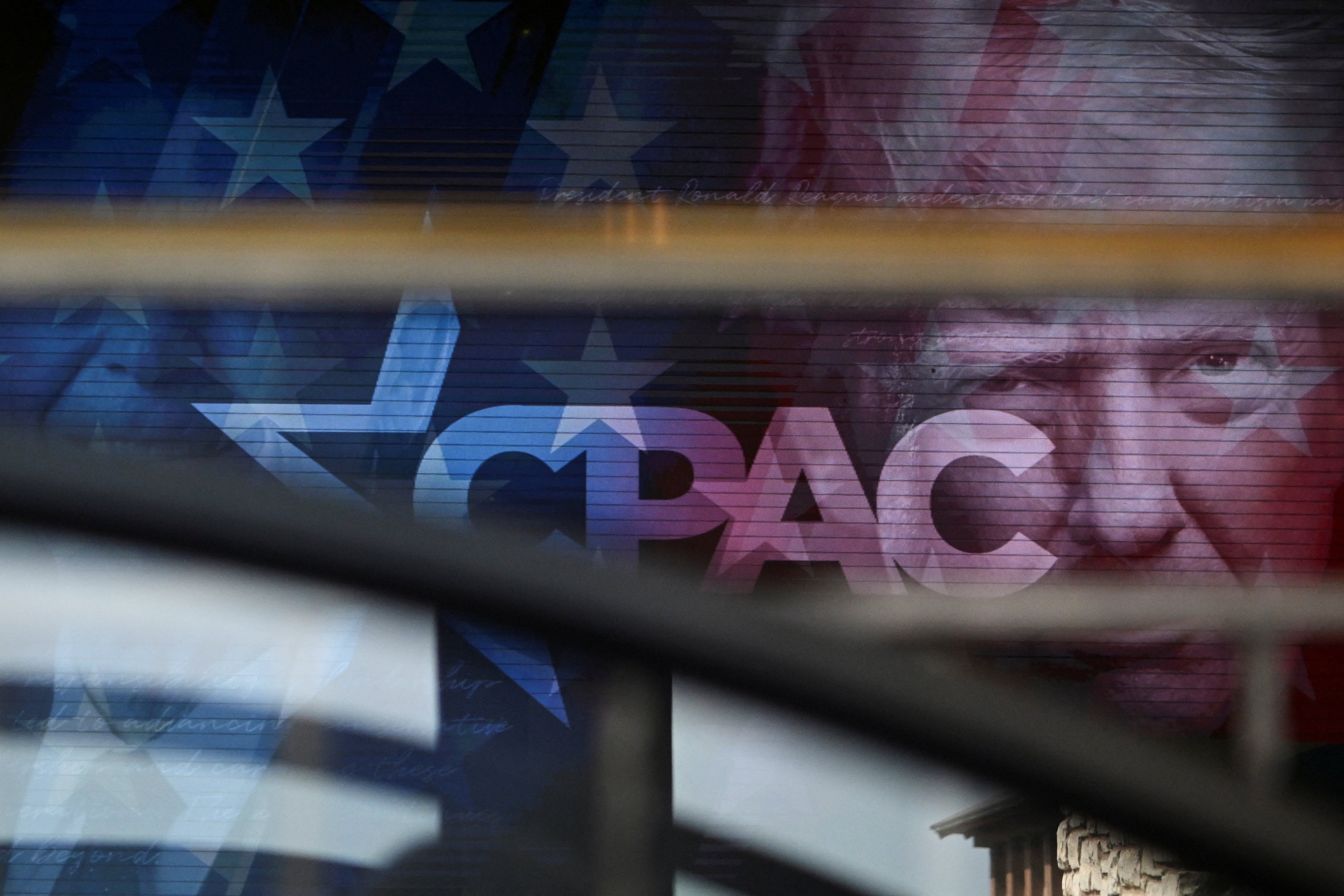 A logo of CPAC and an image depicting US President Donald Trump. Photo: Reuters