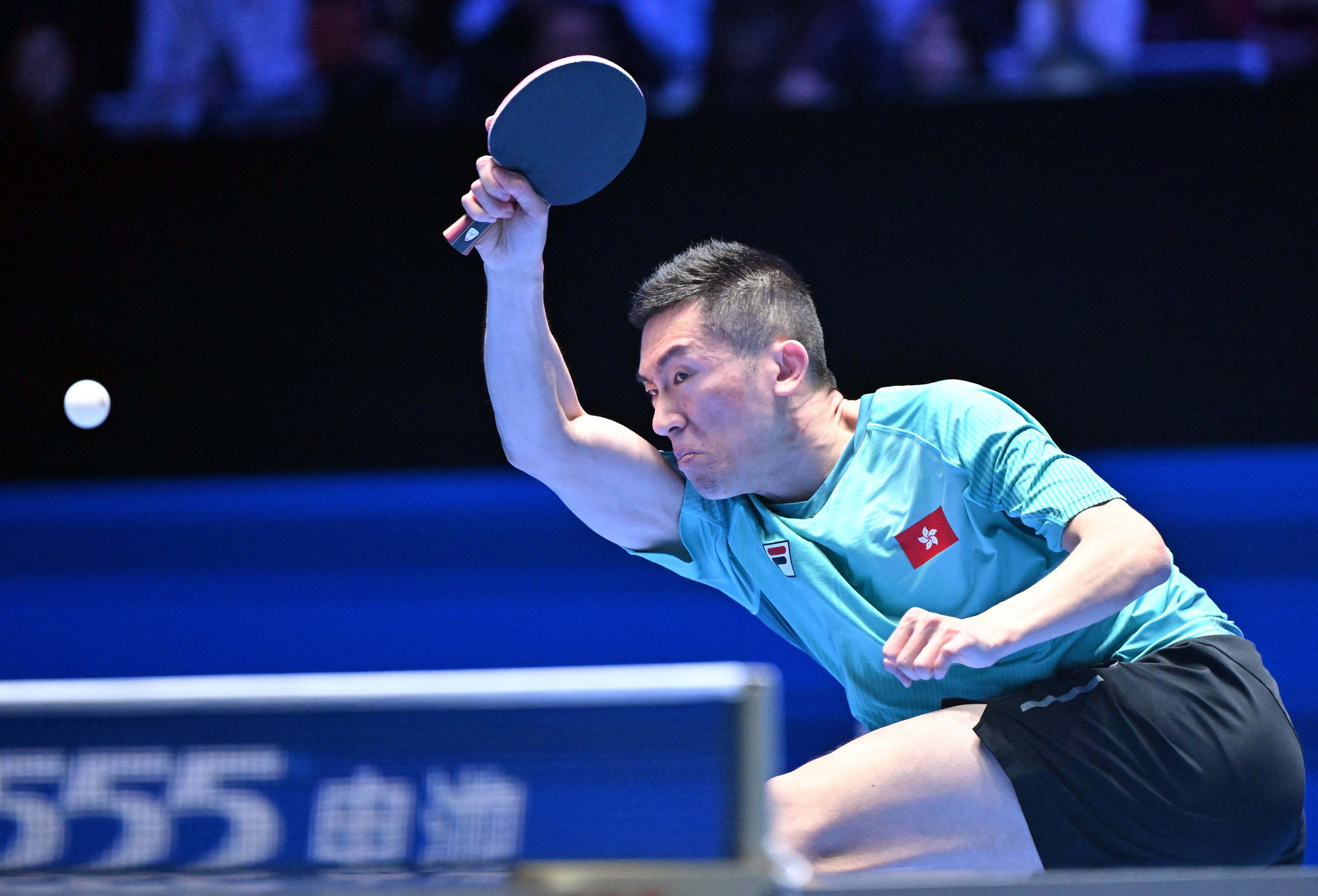 Hong Kong’s Lam Siu-hang hits a return against Uda Yukiya of Japan at the Asian Cup in Haikou last month. Photo: Xinhua