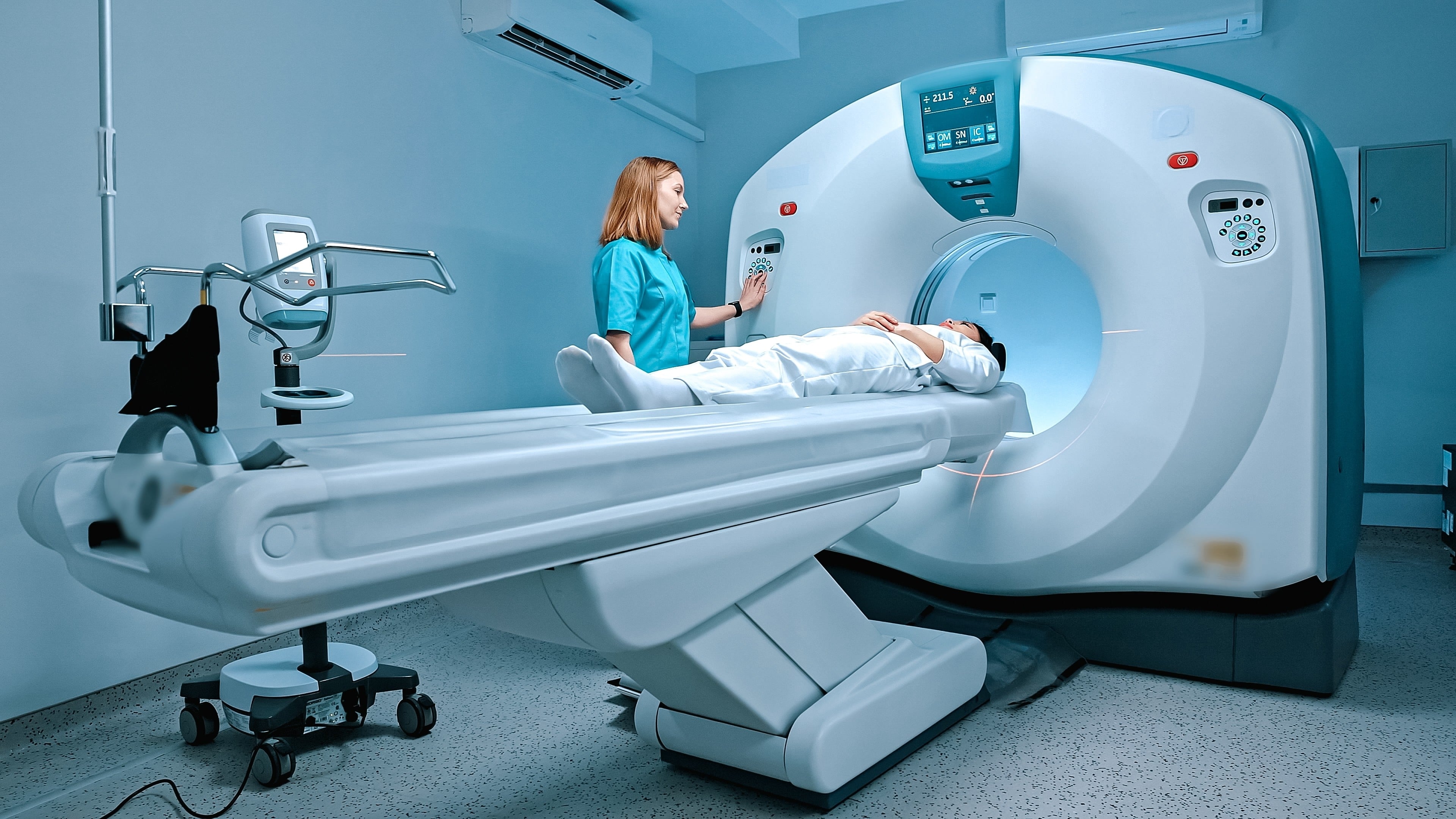 A radiologist gives instructions to a patient about to undergo an MRI scan. Photo: Shutterstock