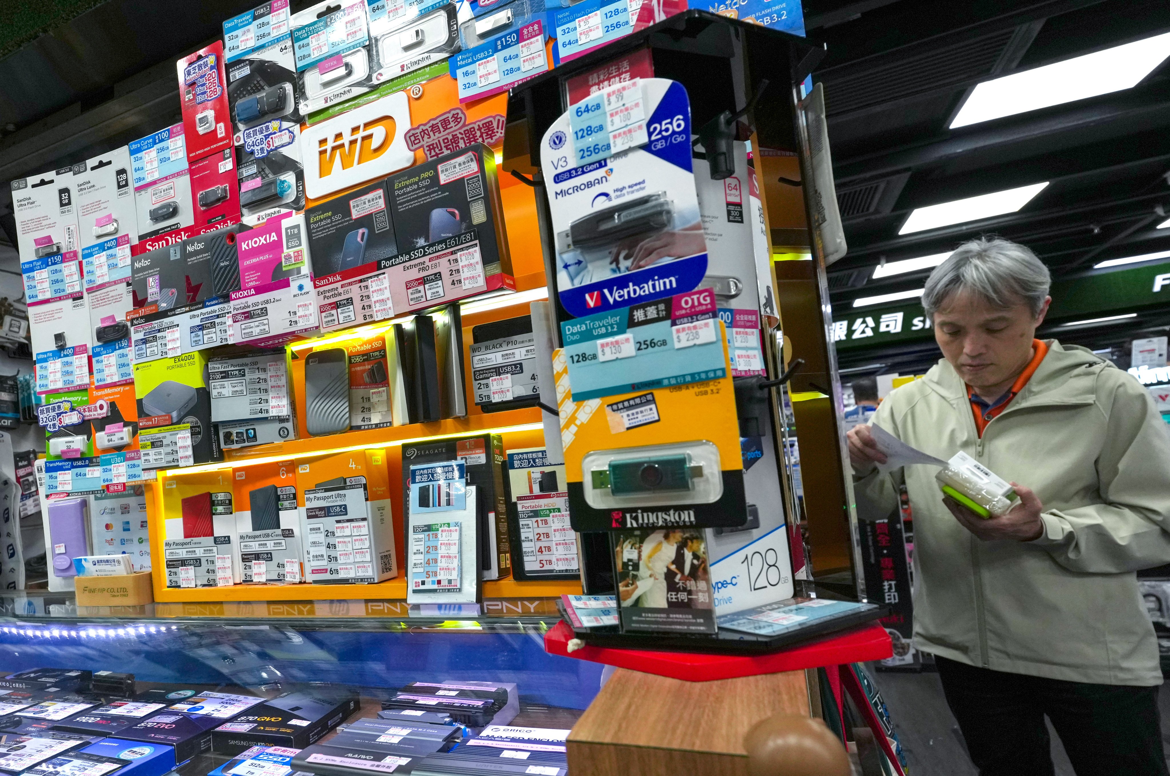 People at Golden computer centre in Sham Shui Po. For price rise of RAM, SD cards and hardisk story. 26MAR26 SCMP / Jelly Tse