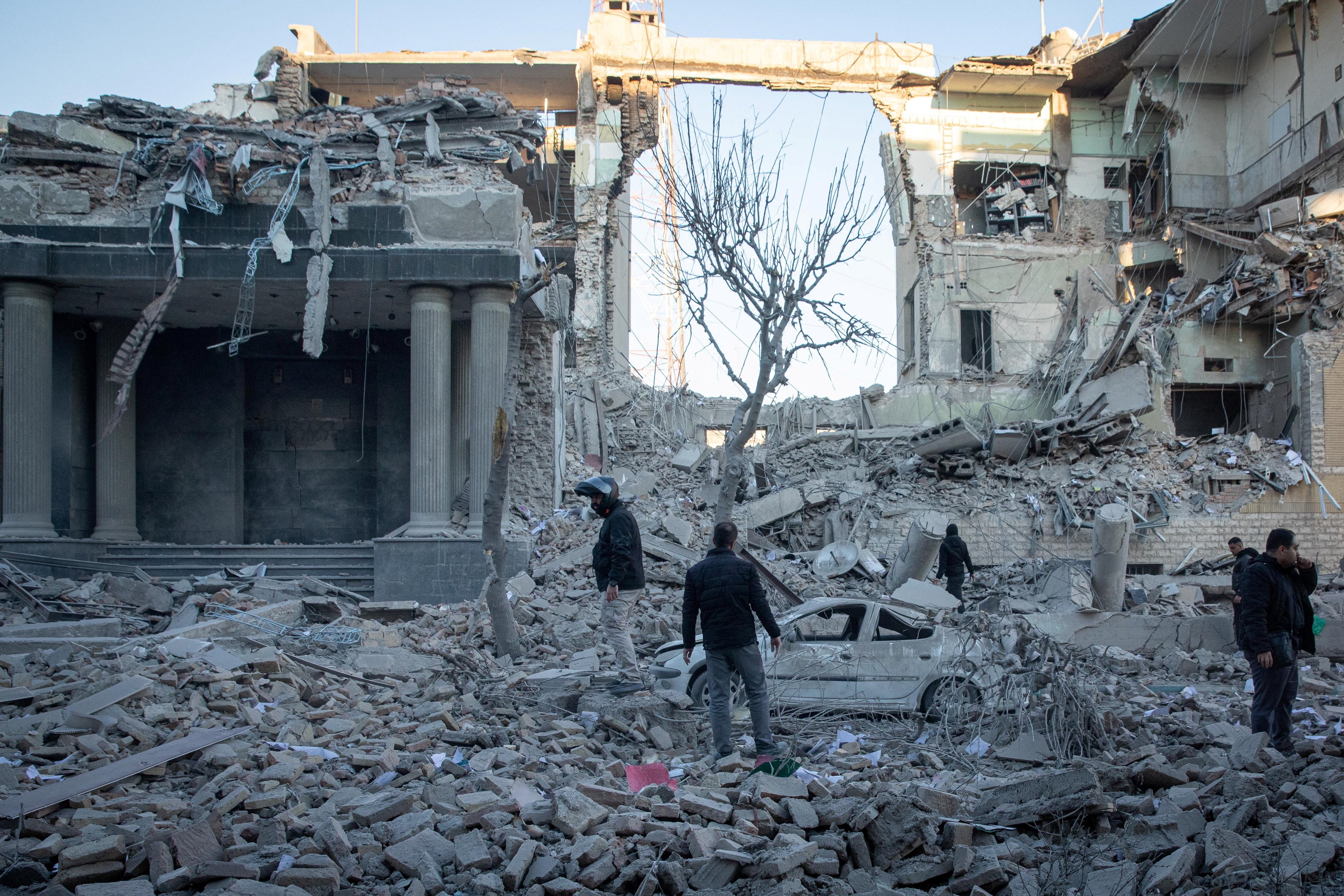 A damaged police station in Tehran following Israeli and US strikes on March 3. Global conflicts are hampering climate goals to reduce or end fossil fuel use. Photo: West Asia News Agency via Reuters