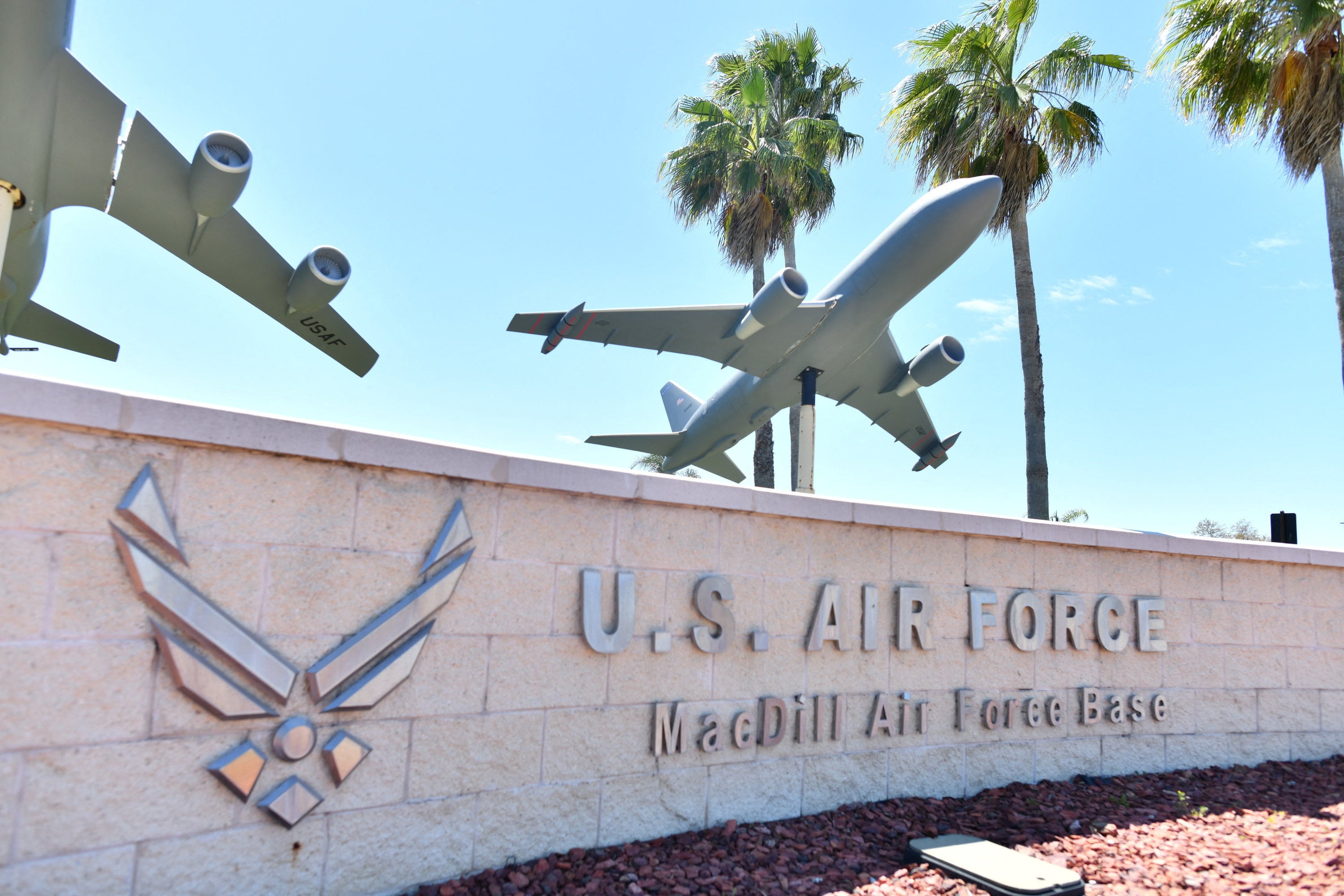 A sign for MacDill Air Force Base is displayed on a wall near the facility’s main gate in Tampa, Florida, on March 18. Photo: Reuters