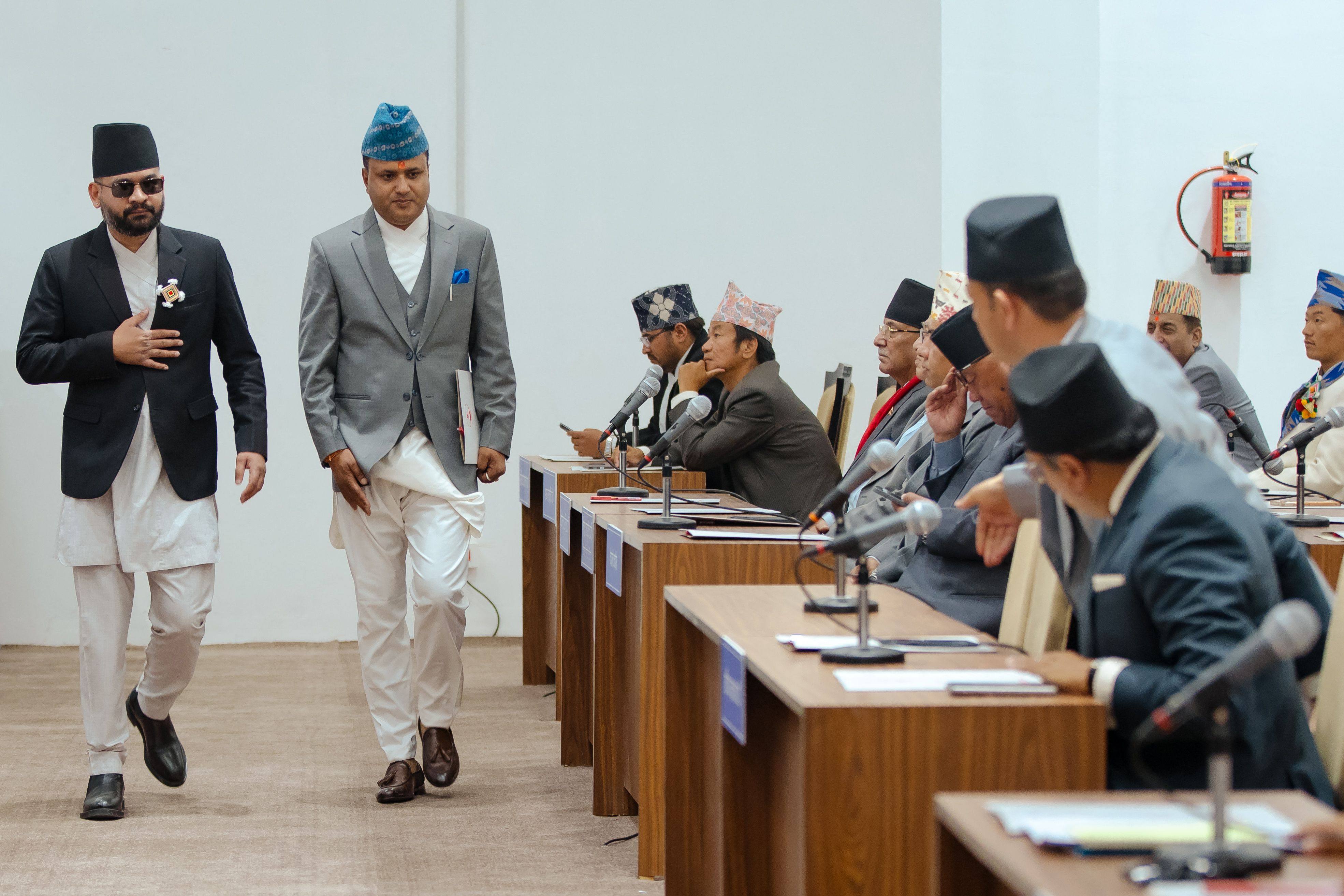 Rastriya Swatantra Party leader Balendra Shah (left) arriving to take his oath. Photo: Nepal’s Photojournalist Club via AFP