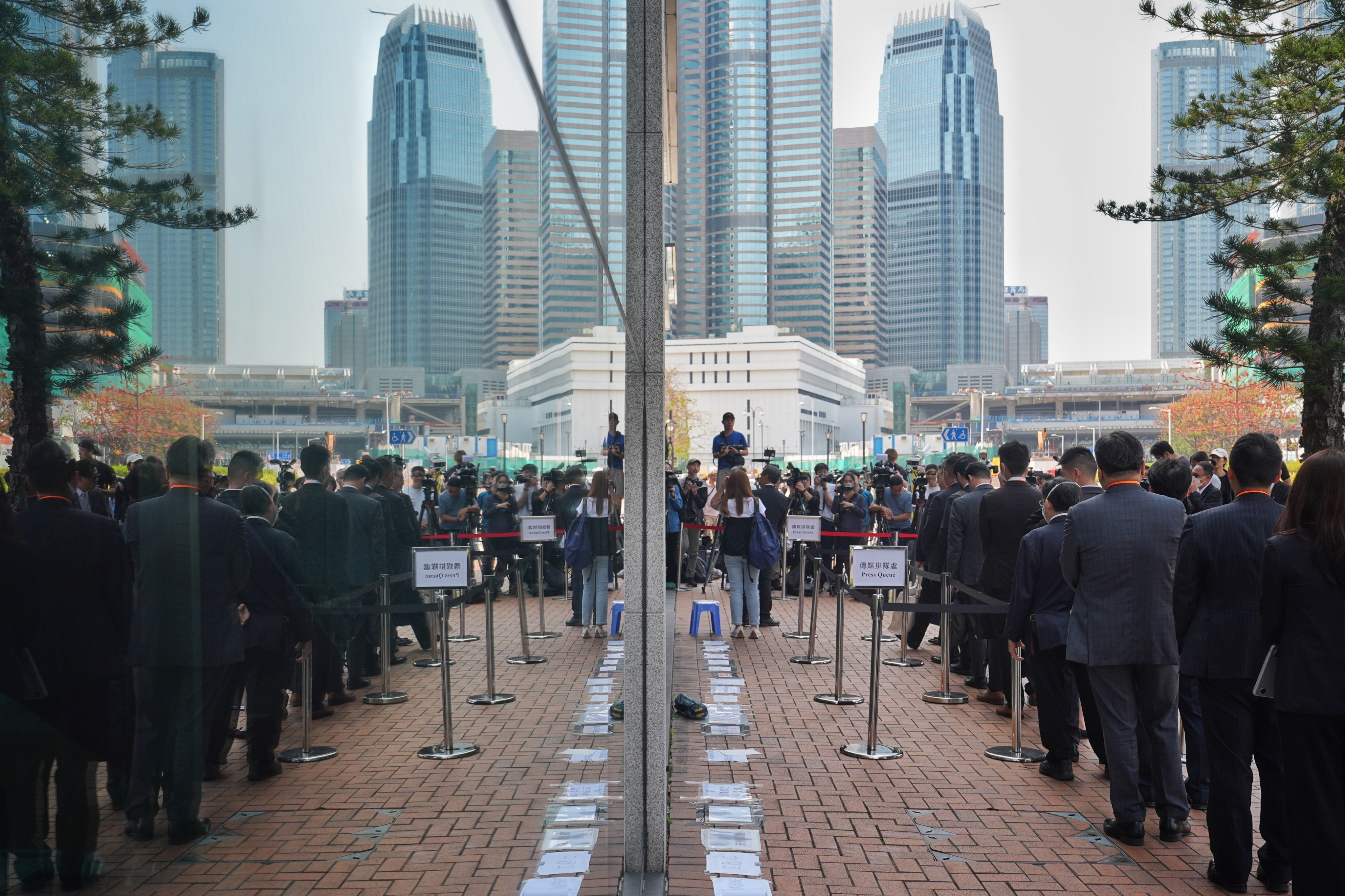 Legal representatives queue up to enter City Gallery for the afternoon session of the first day of the public inquiry hearing of the deadly fire of Wang Fuk Court in Tai Po, Hong Kong, on March 19. Photo: Elson Li
