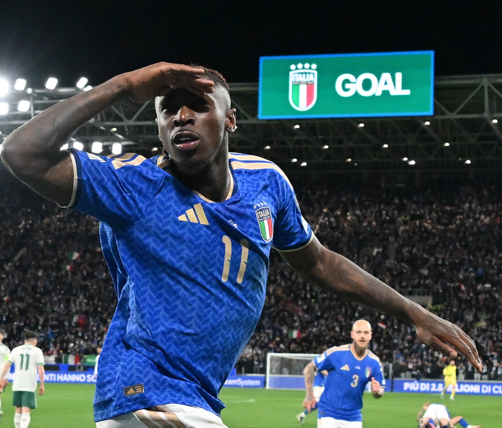 Moise Kean celebrates his goal for Italy as they beat Northern Ireland 2-0 to set up a meeting with Bosnia and Herzegovina for a place at the 2026 World Cup. Photo :Xinhua