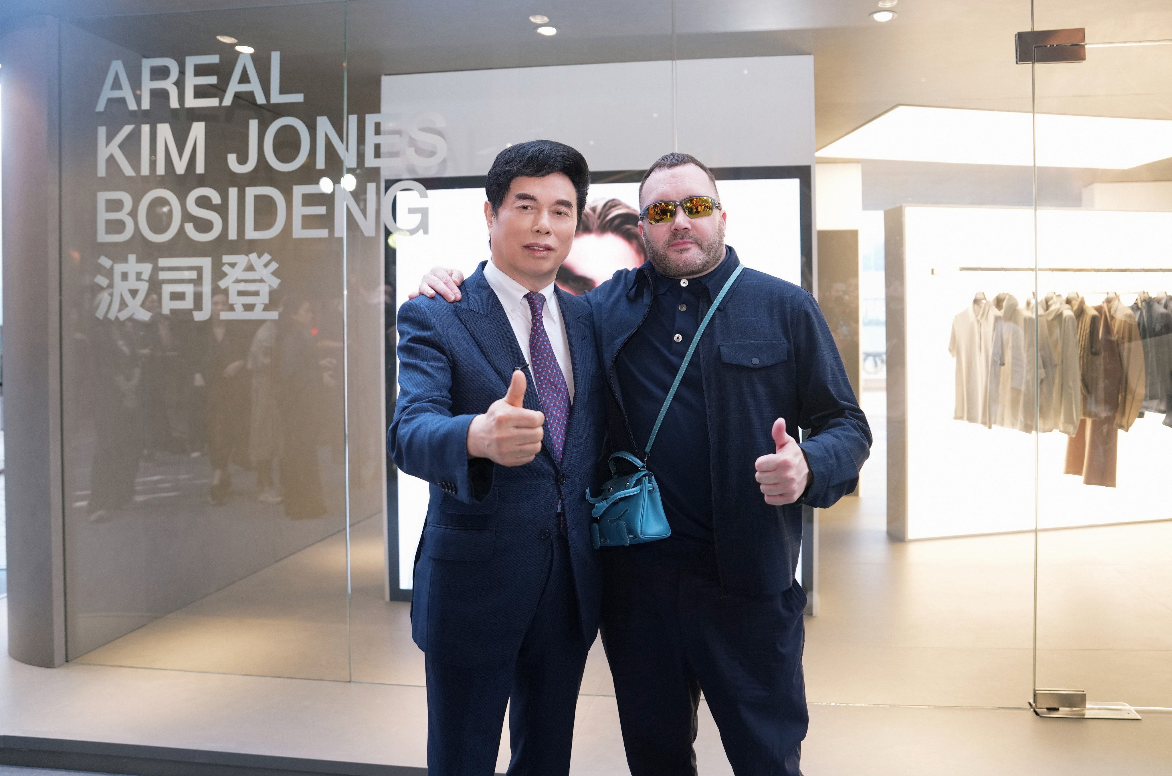Bosideng chairman and CEO Gao Dekang with designer Kim Jones at an Areal pop-up in Hong Kong during Art Basel. Photo: Handout