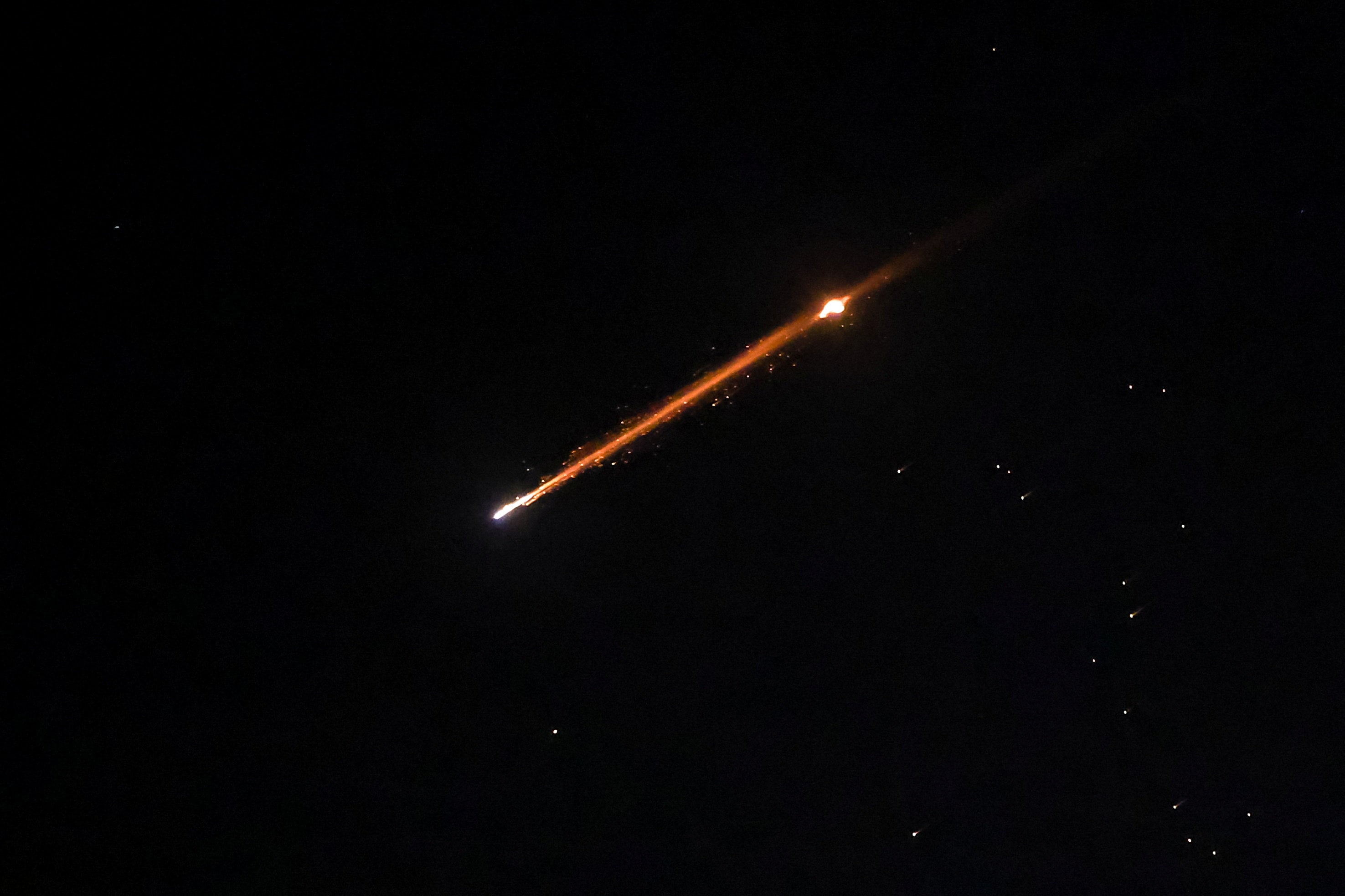 An Iranian missile with cluster munitions flies over Jerusalem on March 20. Photo: Reuters