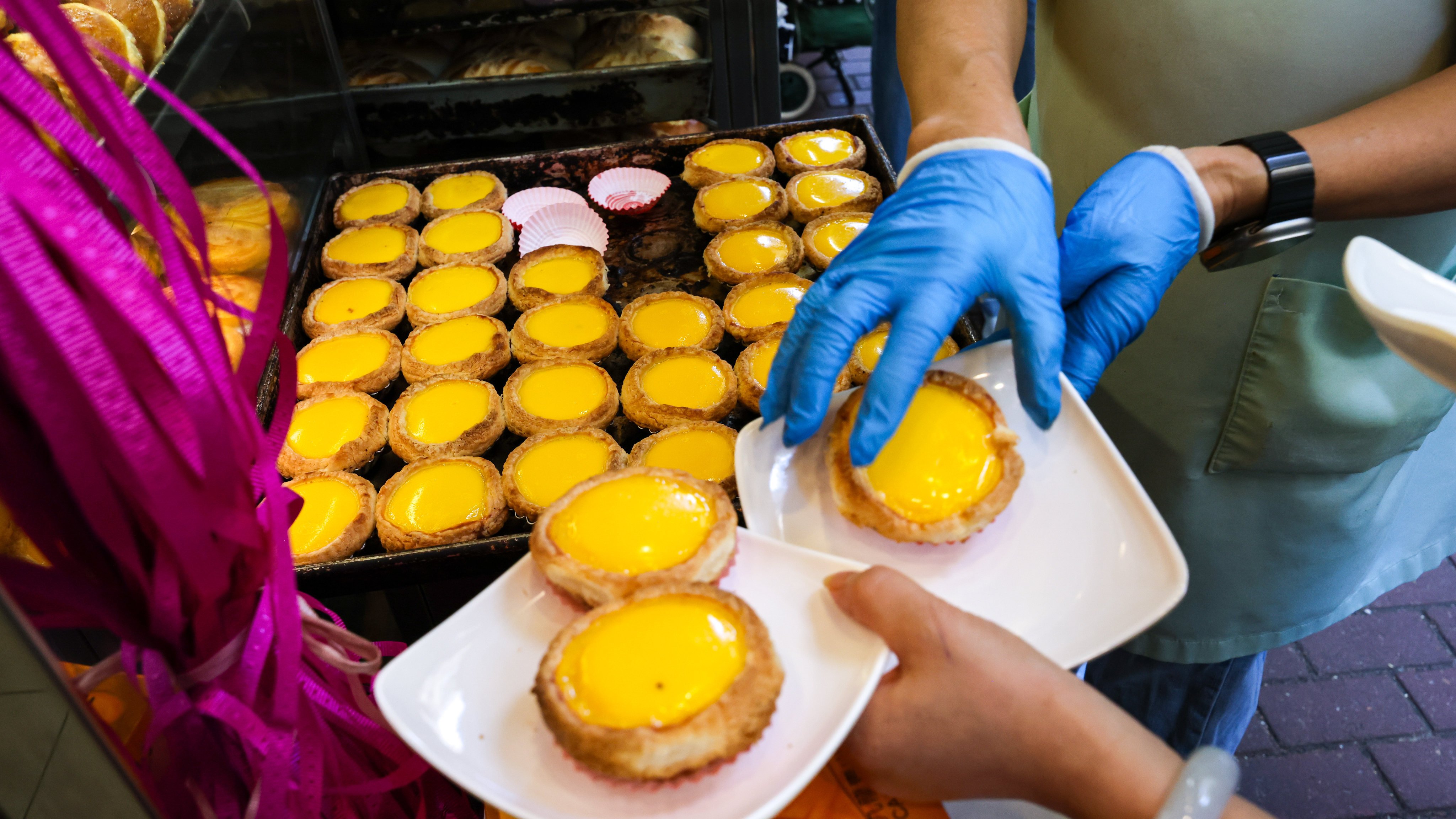 Egg tarts from the now closed Gold Garden Cafe in Cheung Sha Wan, Hong Kong. The Cantonese name for the tarts, daan tat, has entered the Oxford English Dictionary. Photo: Jelly Tse