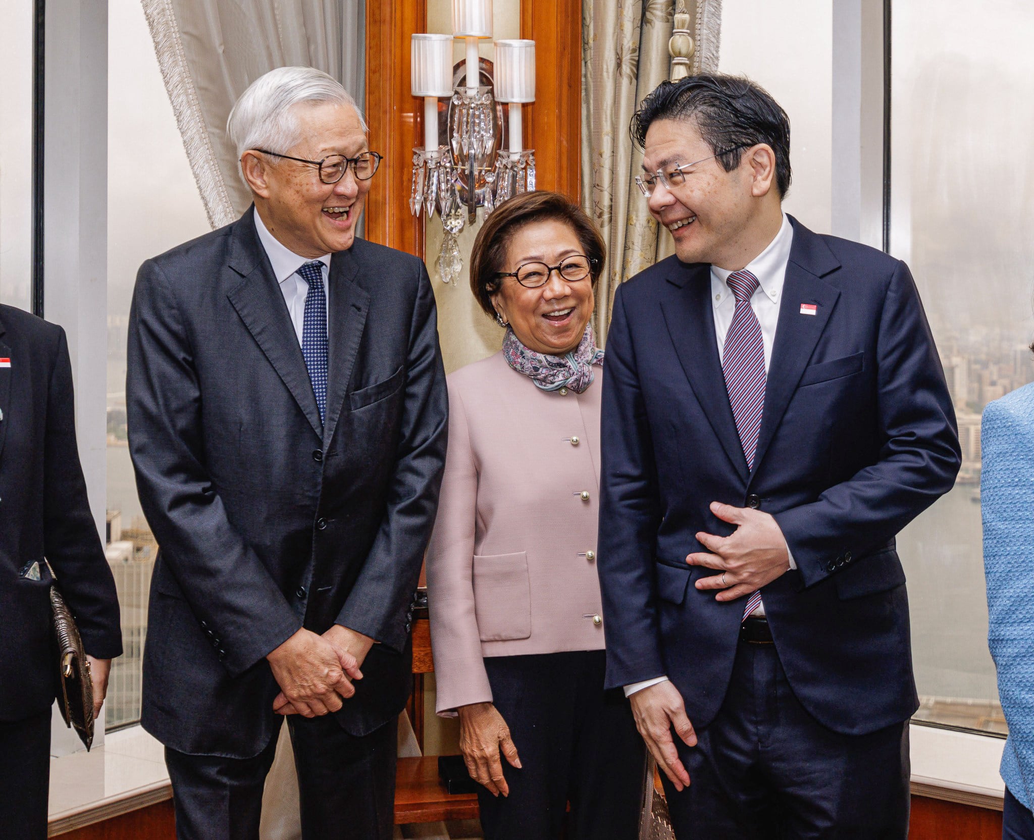 Singapore Prime Minister Lawrence Wong (right) meets former Hong Kong Chief Justice Andrew Li (left) and ex-chairwoman of Hong Kong Exchanges and Clearing Laura Cha. Photo: Facebook/Lawrence Wong