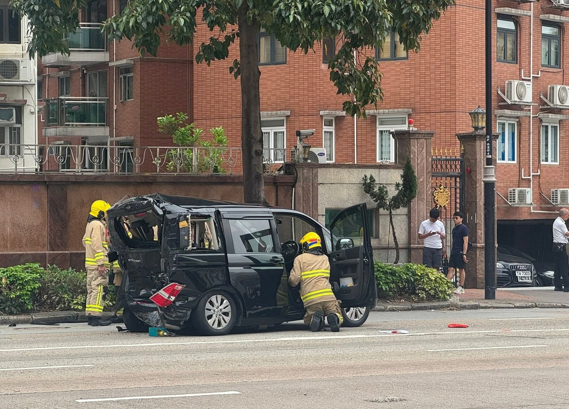 A car was one of the three vehicles involved in the collision after a van driver lost control on Prince Edward Road West towards Mong Kok. Photo: Facebook/pttthk