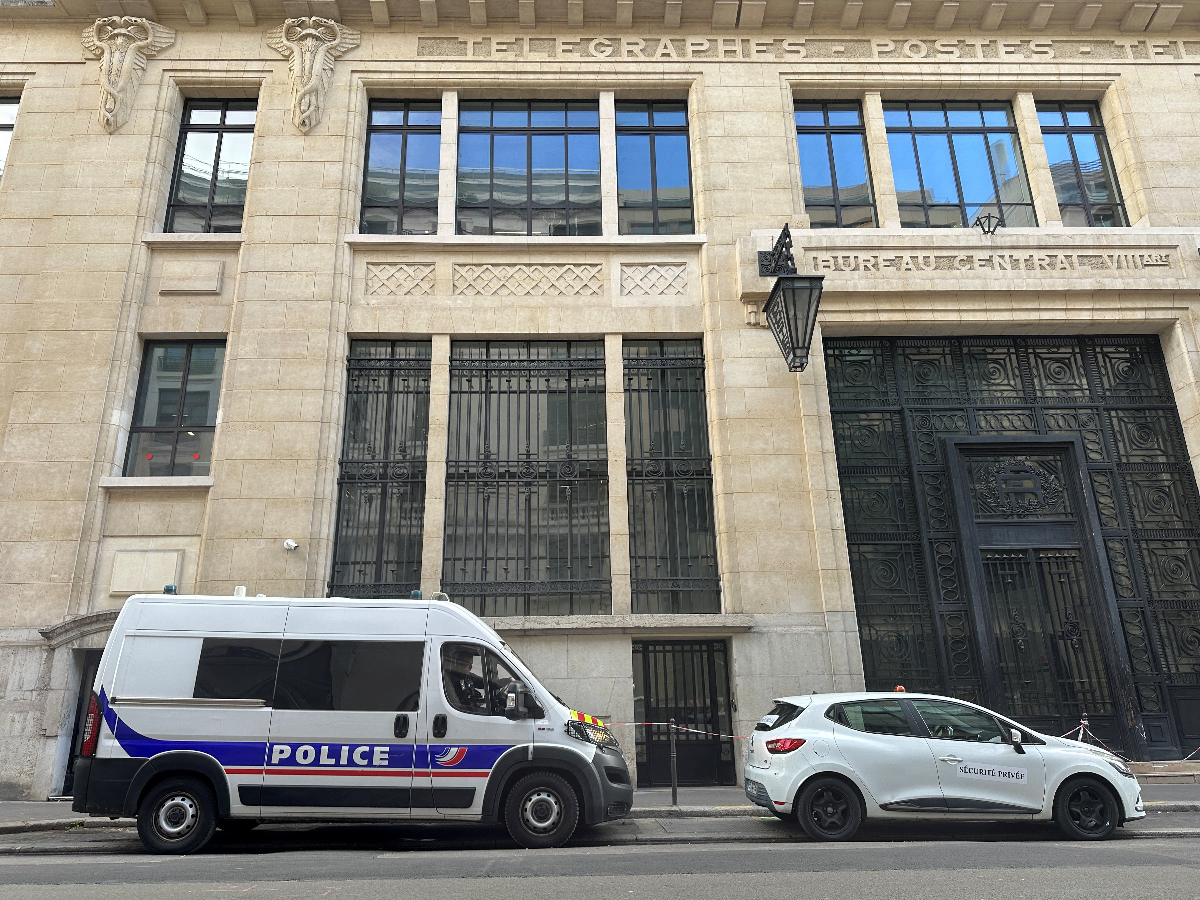 A police van outside the building housing Bank of America’s Paris offices, after French anti-terrorism prosecutors opened an investigation into a suspected attack on the premises, on Saturday. Photo: Reuters
