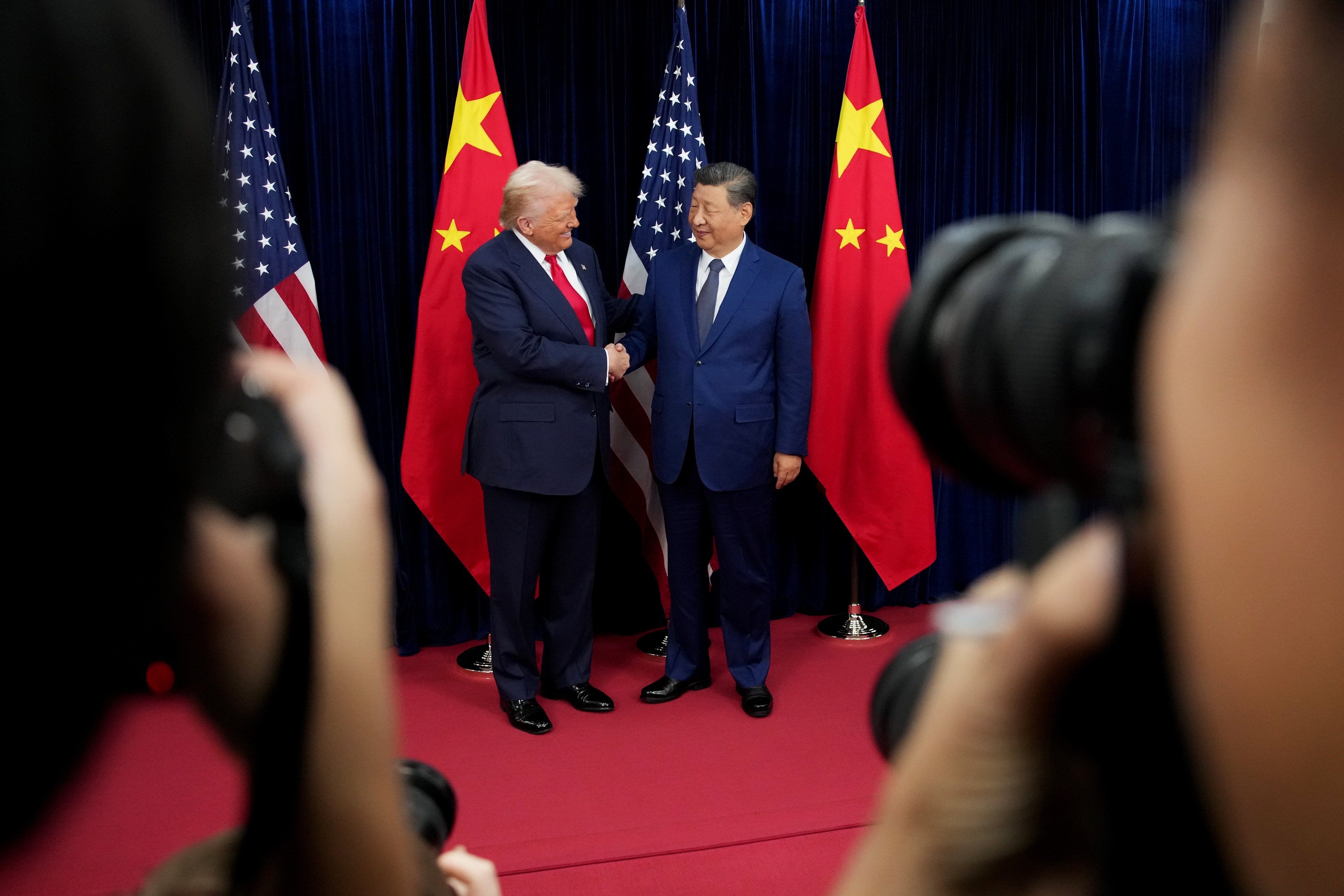 US President Donald Trump greets Chinese President Xi Jinping ahead of a bilateral meeting at Gimhae Air Base on October 30, 2025, in Busan, South Korea. Photo: Getty Images