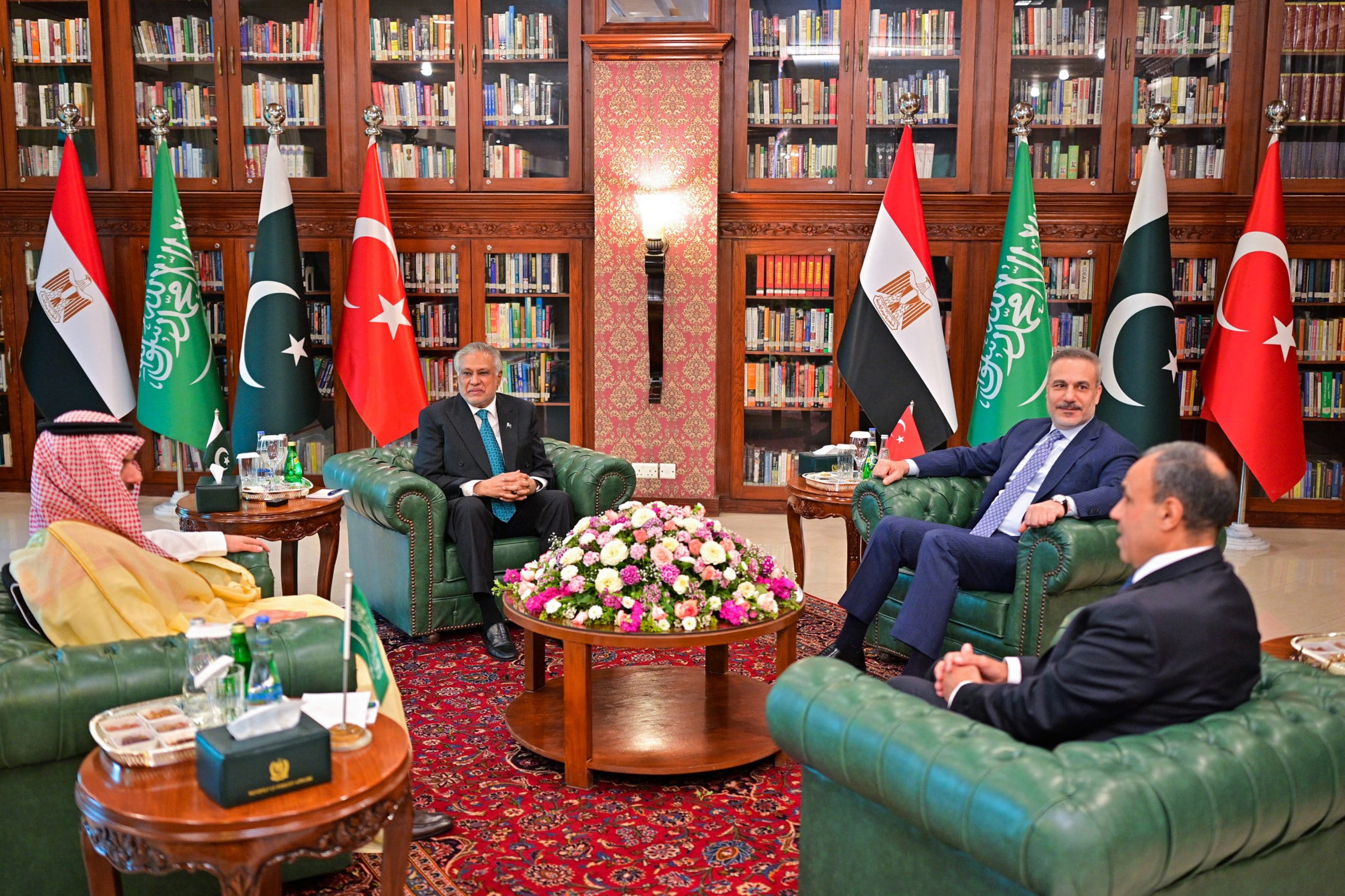 This handout photograph taken on March 29, 2026 and released by Pakistan’s Ministry of Foreign Affairs shows Pakistan’s Foreign Minister Ishaq Dar (2L) in a meeting with his counterparts Saudi Arabia’s Faisal bin Farhan (L), Turkey’s Hakan Fidan (2R) and Egypt’s Badr Abdelatty at the Foreign Ministry office in Islamabad. Foreign ministers from Pakistan, Saudi Arabia, Egypt and Turkey were expected to meet on March 29 for talks on the war in the Middle East, with Islamabad acting as a go-between between the United States and Iran. (Photo by Pakistan Foreign Ministry / AFP) / RESTRICTED TO EDITORIAL USE - MANDATORY CREDIT “AFP PHOTO / - / Pakistan’s Ministry of Foreign Affairs” - HANDOUT - NO MARKETING NO ADVERTISING CAMPAIGNS - DISTRIBUTED AS A SERVICE TO CLIENTS