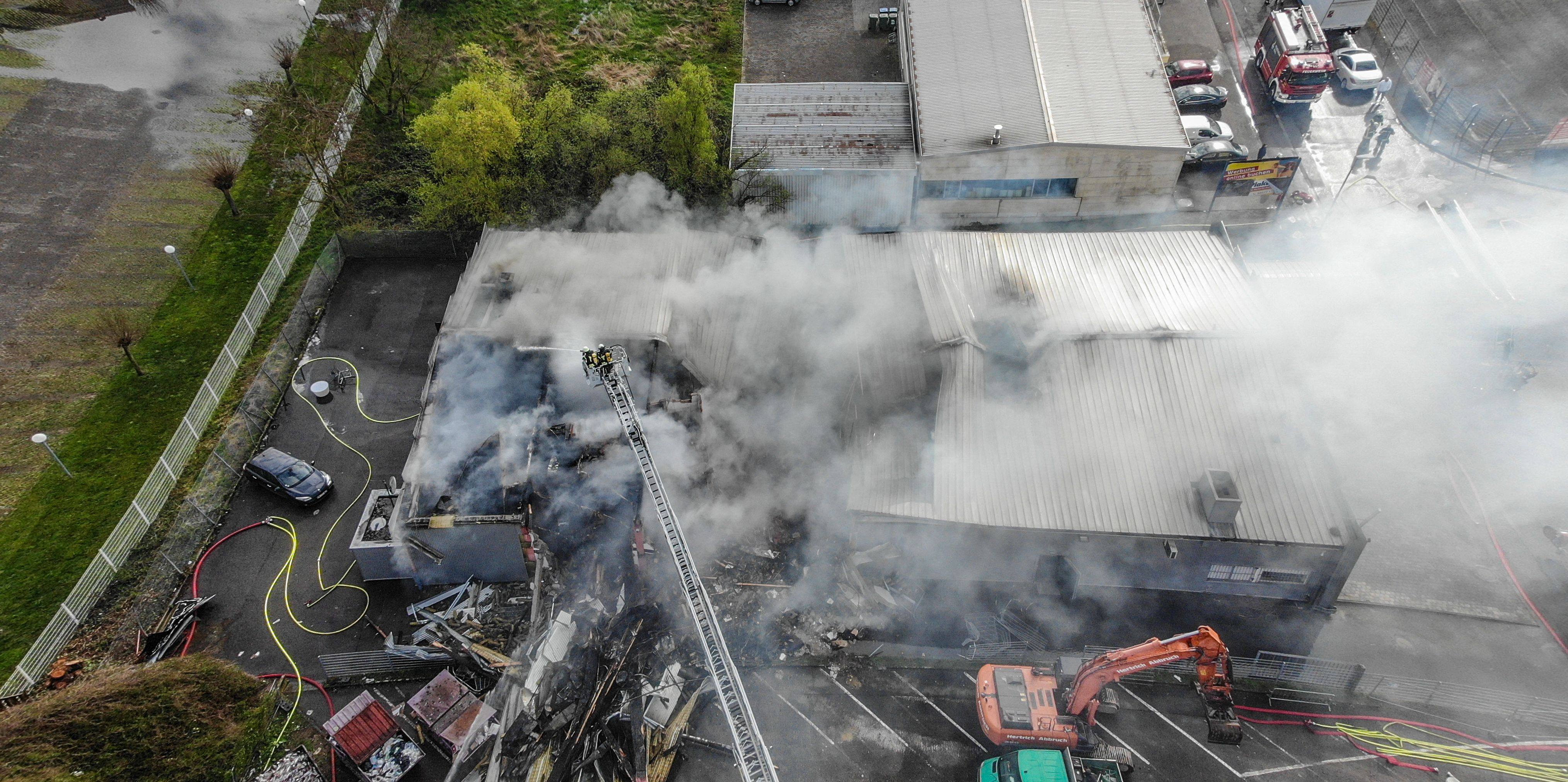 Smoke rises from the roof of a building, the site of a fire at the K nightclub in Kehl, southwestern Germany on Sunday. Photo: Feuerwehr Kehl / AFP / Handout