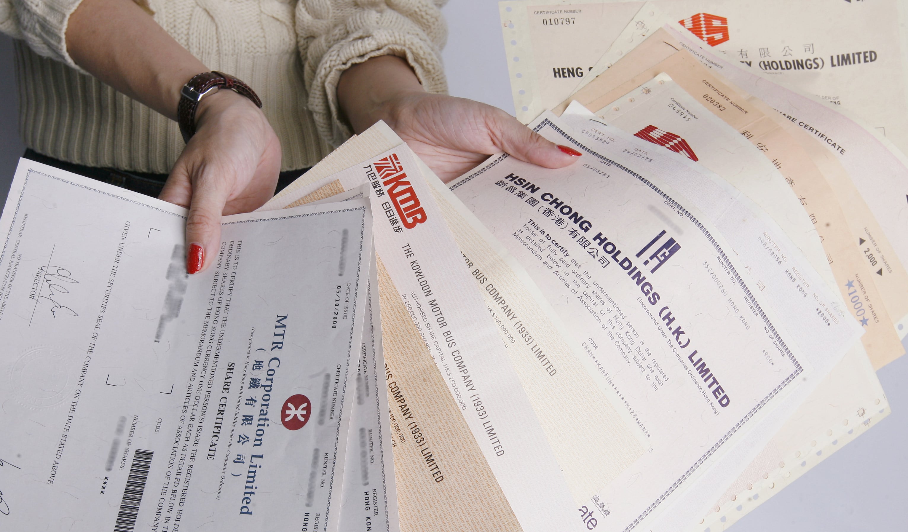 End of an era: the SFC says firms issuing shares after November 16 will no longer issue physical share certificates. Photo: SCMP