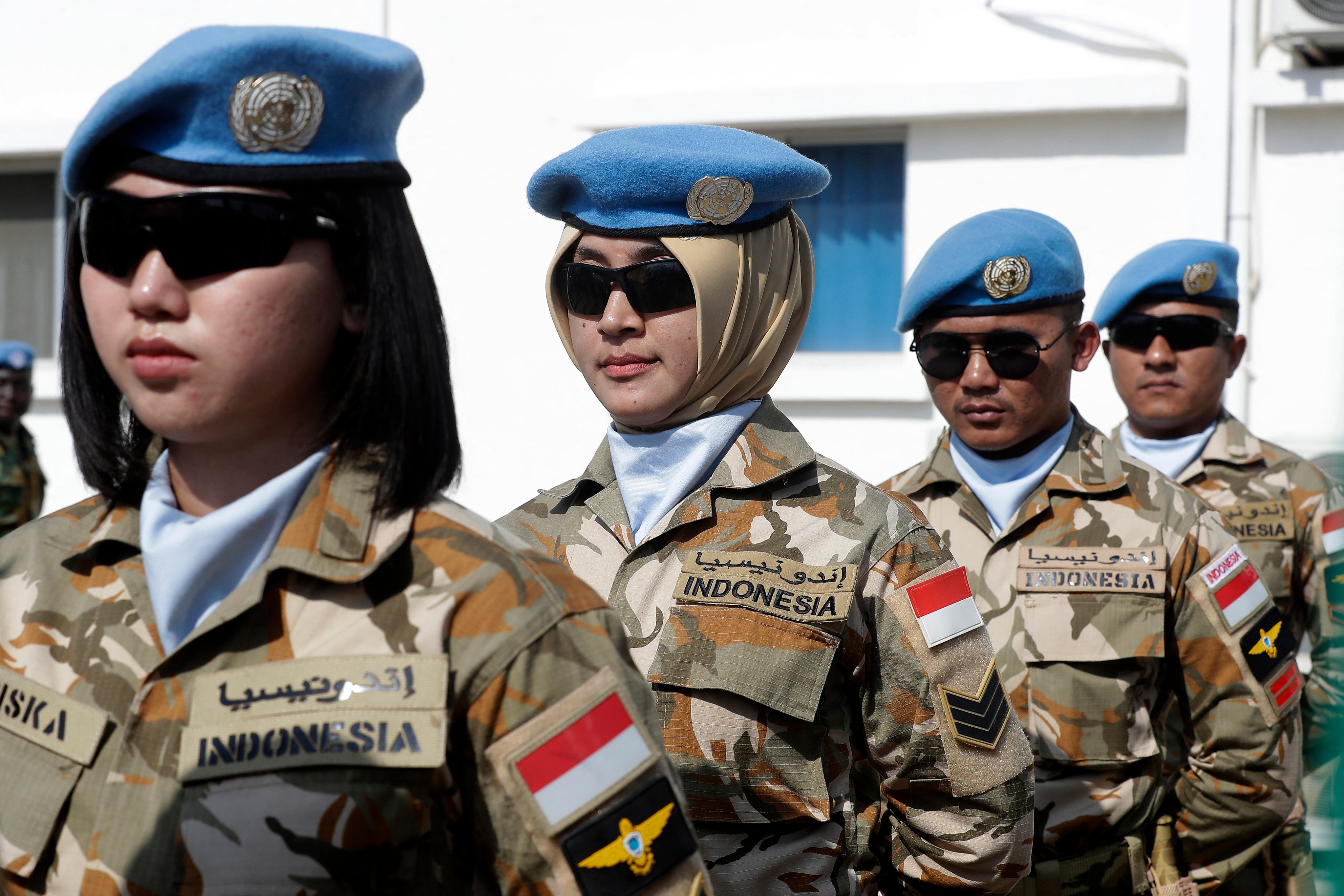 Indonesian peacekeepers, members of the United Nations Interim Force In Lebanon (UNIFIL), attend a ceremony at their headquarters in southern Lebanon in 2022. Photo: AFP