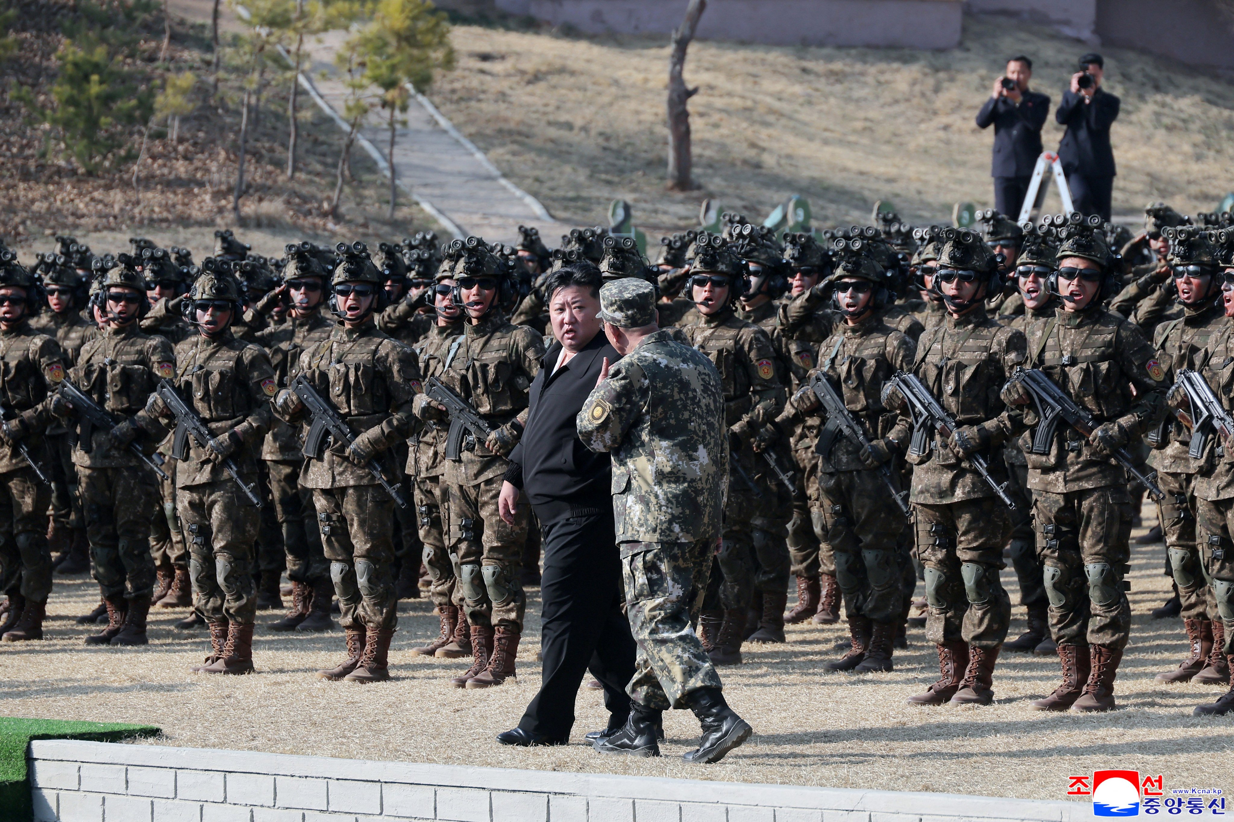 This undated picture released by North Korea’s official Korean Central News Agency (KCNA) on March 29, 2026 shows North Korean leader Kim Jong Un (C) inspecting the training of special operations sub-units at all levels at an undisclosed location in North Korea. (Photo by KCNA VIA KNS / AFP) / South Korea OUT / ---EDITORS NOTE--- RESTRICTED TO EDITORIAL USE - MANDATORY CREDIT “AFP PHOTO/KCNA VIA KNS” - NO MARKETING NO ADVERTISING CAMPAIGNS - DISTRIBUTED AS A SERVICE TO CLIENTS
THIS PICTURE WAS MADE AVAILABLE BY A THIRD PARTY. AFP CAN NOT INDEPENDENTLY VERIFY THE AUTHENTICITY, LOCATION, DATE AND CONTENT OF THIS IMAGE. /