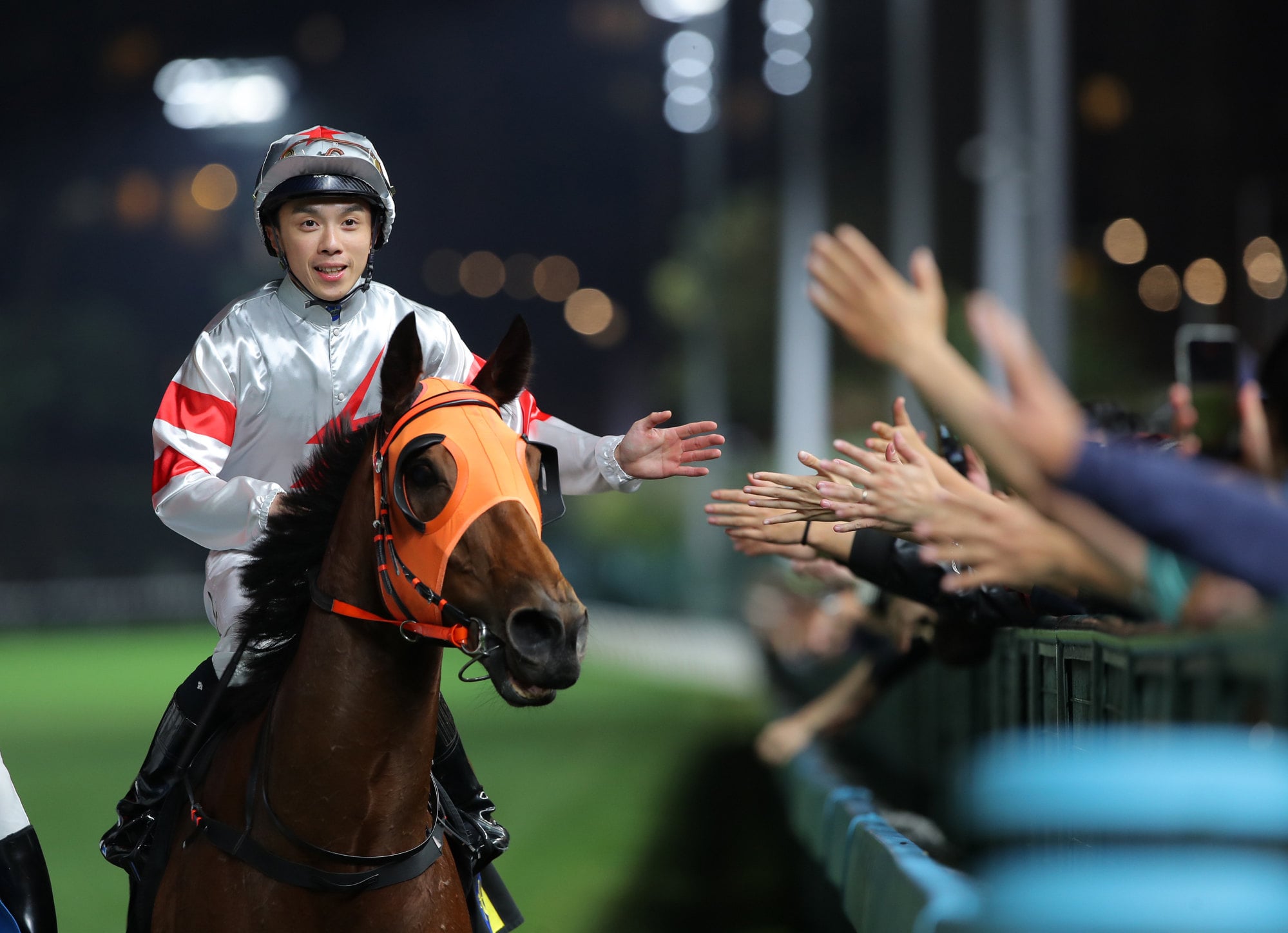 Macanese Master and Angus Chung return to the winners enclosure at Happy Valley. Macanese Master and Angus Chung return to the winners enclosure at Happy Valley.