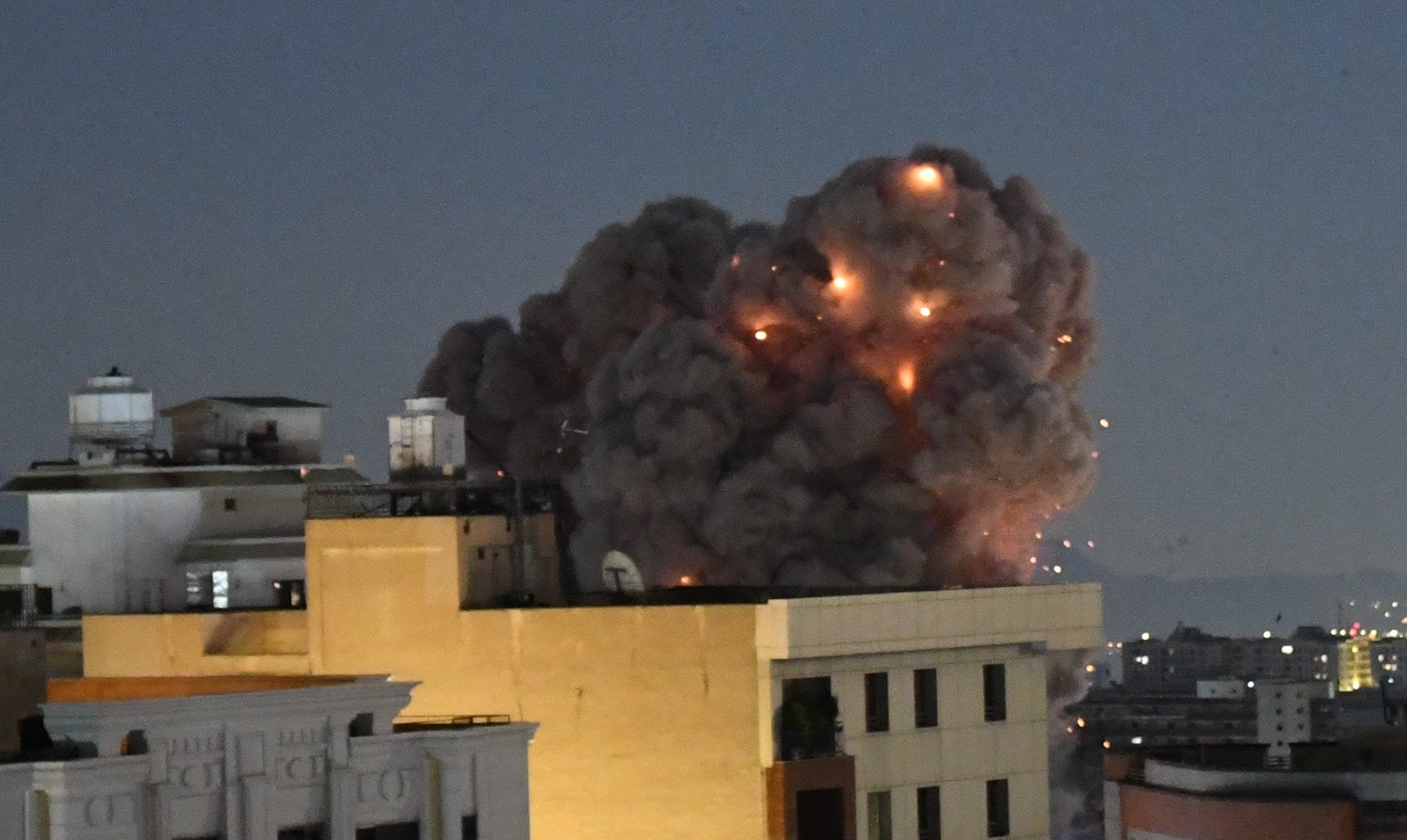 A plume of smoke rises from the site of a strike in Iran, Tehran, on Sunday. Photo: Xinhua