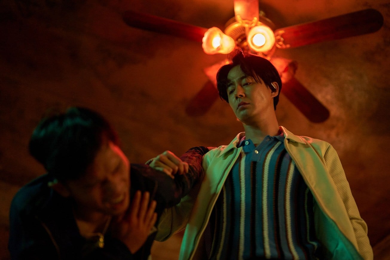 Zo In-sung (right) in a still from Humint, a Korean spy movie from director Ryoo Seung-wan that is now streaming on Netflix.