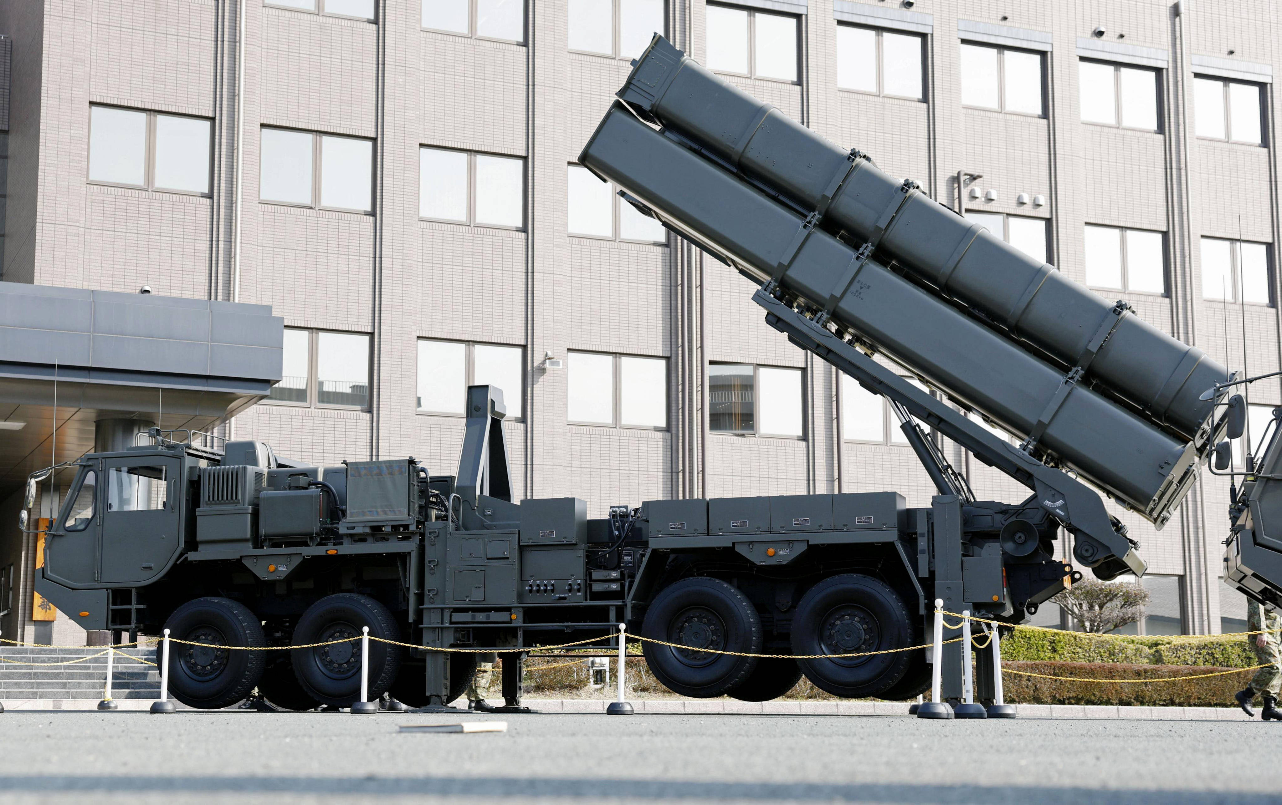 The Type 12 land-to-ship missile launcher is stationed outside Camp Kengun in Kumamoto prefecture, Japan. Photo: Kyodo News via AP