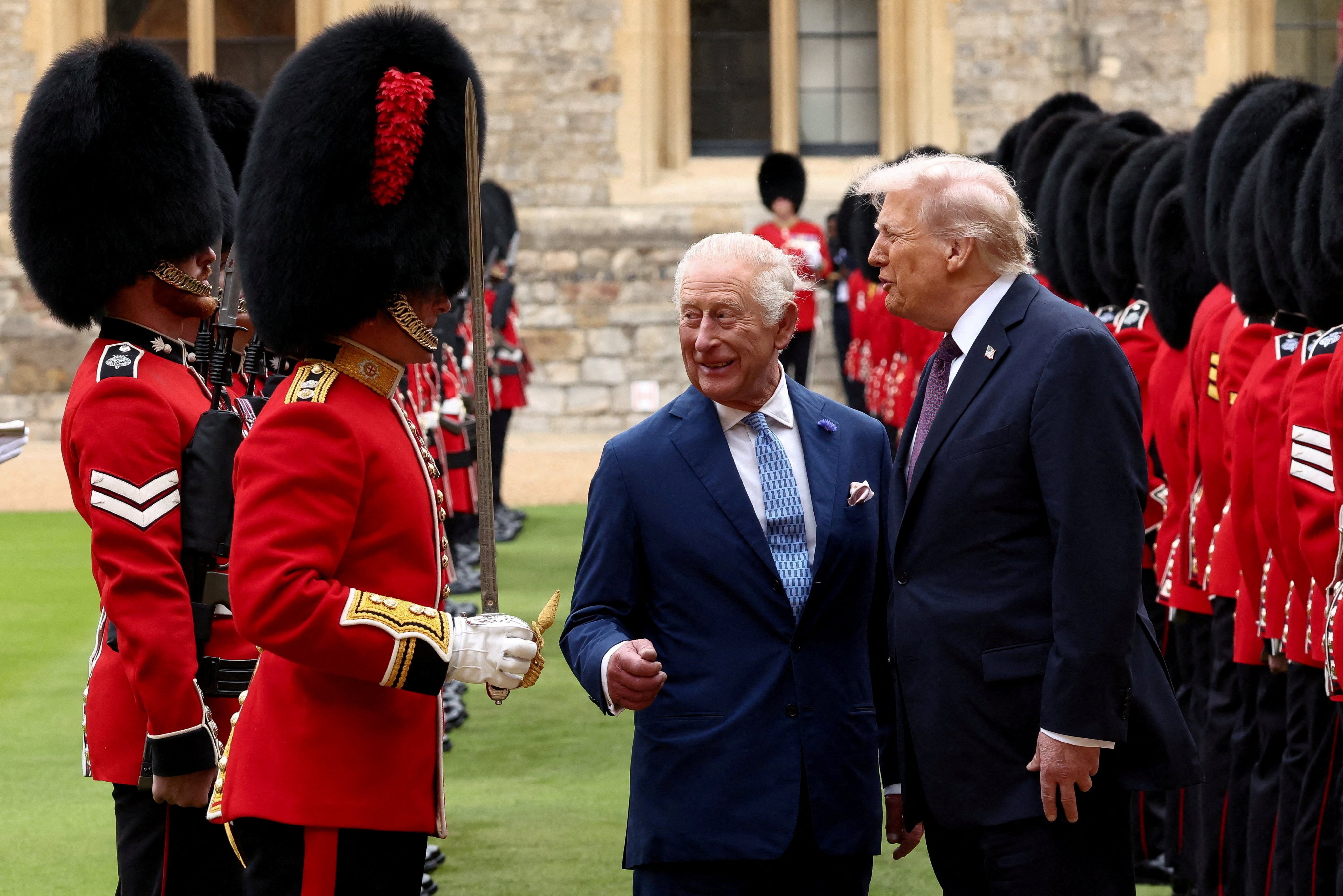 US President Donald Trump (right) and Britain’s King Charles inspect the Guard of Honour during Trump’s state visit at Windsor Castle on September 17, 2025. Photo: Reuters