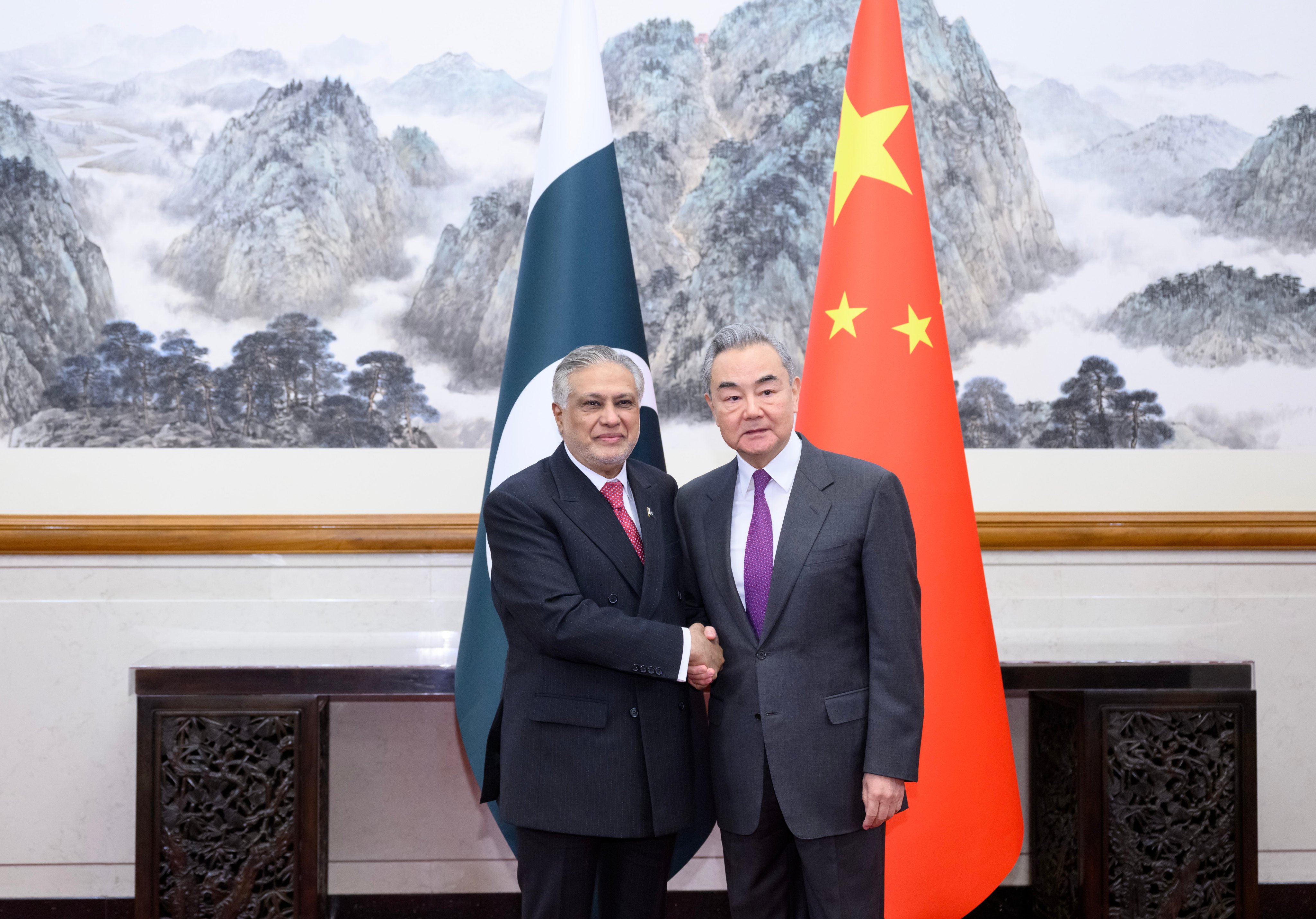Pakistani Foreign Minister Ishaq Dar (left) meets his Chinese counterpart Wang Yi in Beijing on January 4. Dar is visiting China again this week – his second trip to the country in three months. Photo: Xinhua
