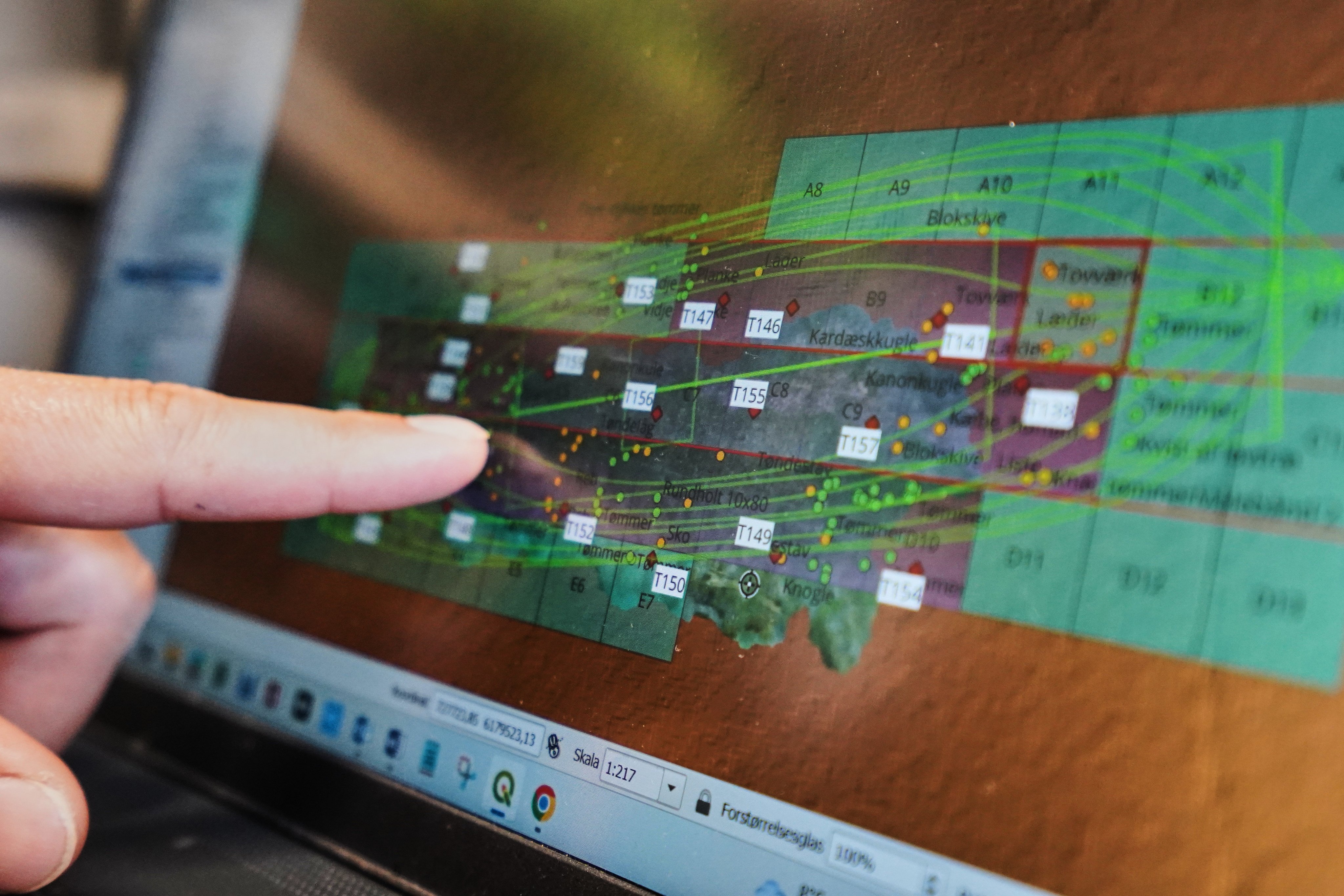 An archaeologist points to a computer screen, showing a map of the wreck of Danish flagship Dannebroge that sank during the Battle of Copenhagen in 1801. Photo: AP