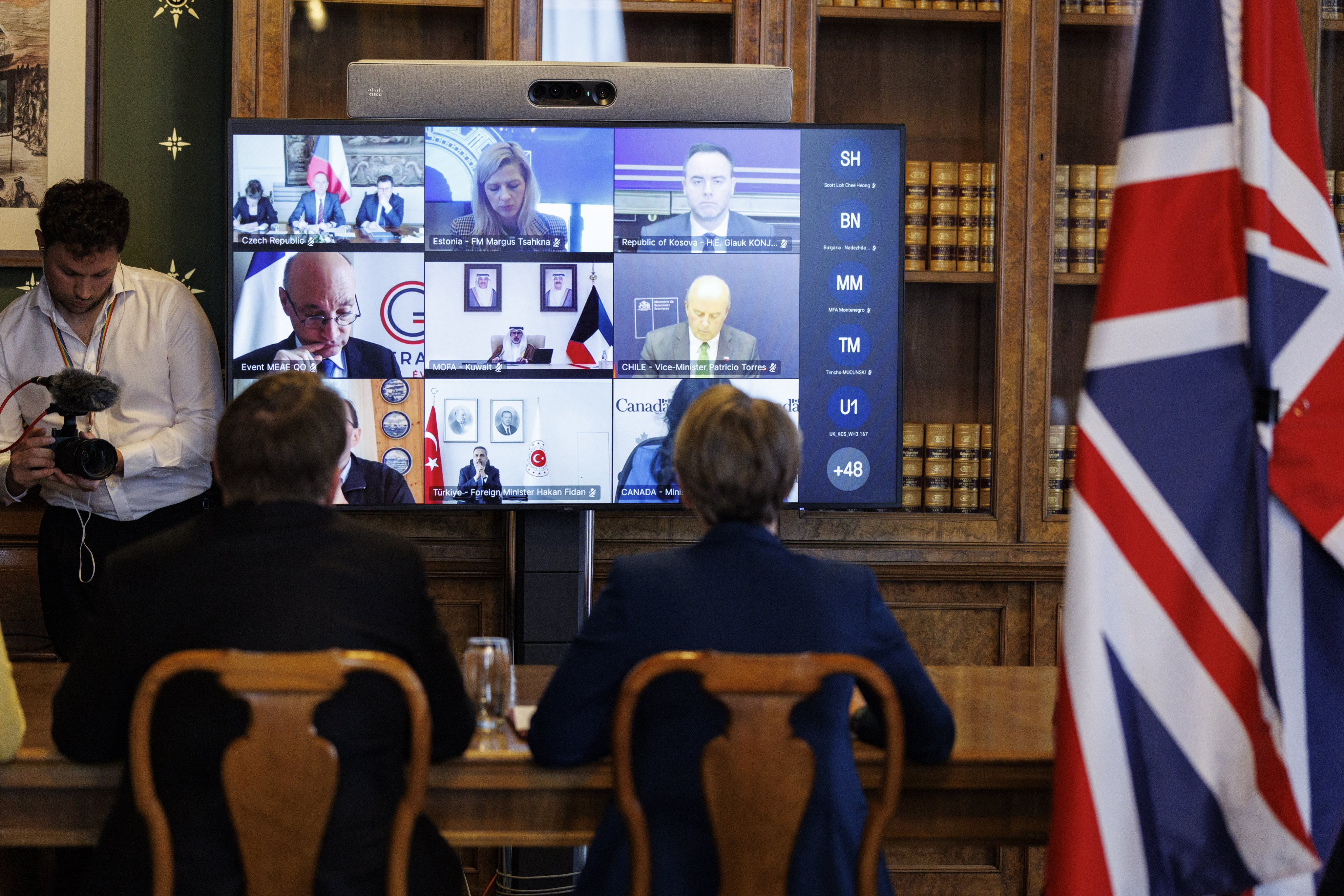 British Foreign Secretary Yvette Cooper (right) gives her opening remarks as she hosts a virtual meeting with the foreign ministers of the signatory countries on securing the Strait of Hormuz in London on Thursday. Photo: EPA