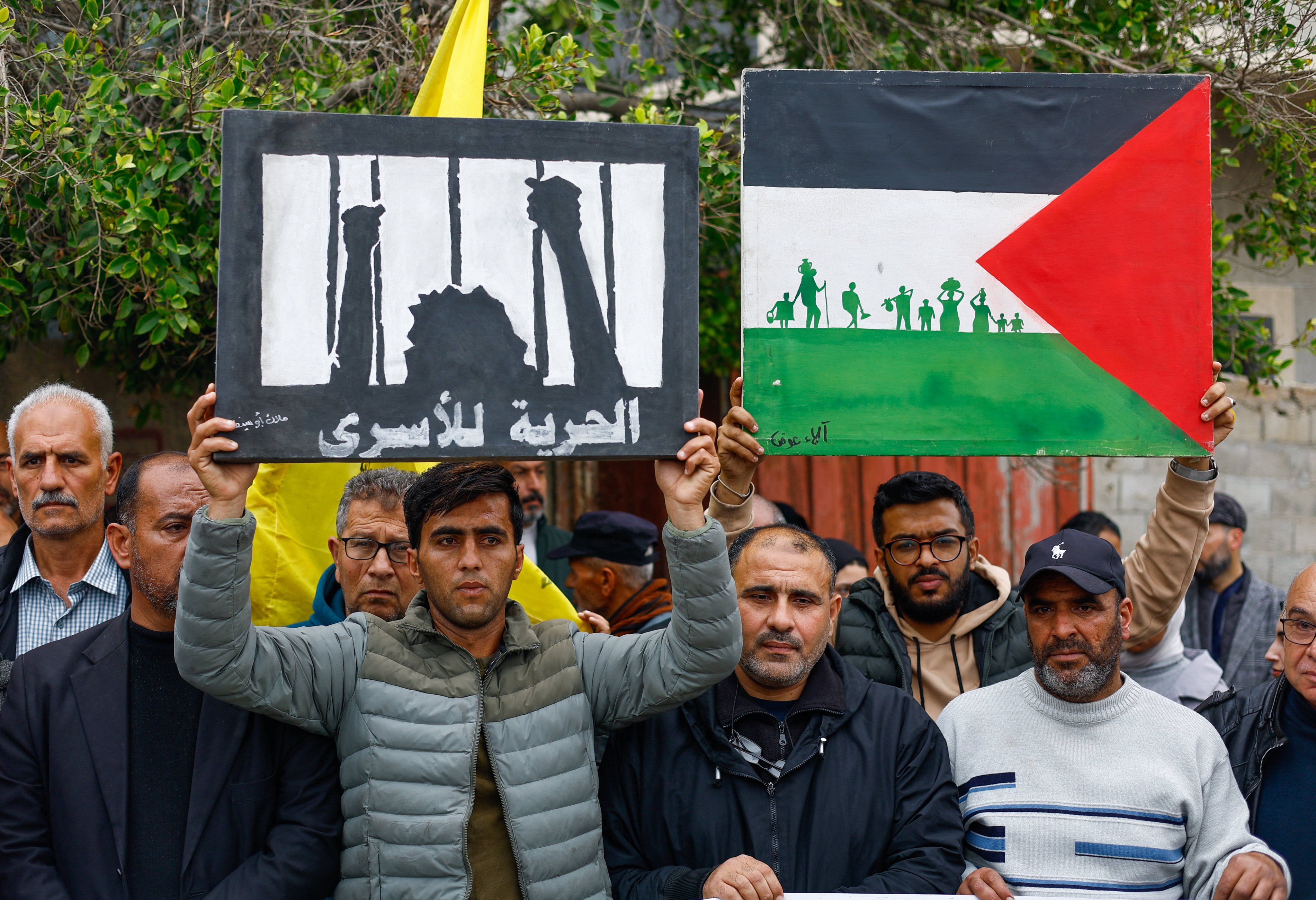 Palestinians take part in a protest against the Israeli death penalty law for Palestinians convicted in military courts of deadly attacks, at the headquarters of the International Committee of the Red Cross in Deir al-Balah in the central Gaza Strip. Photo: Reuters