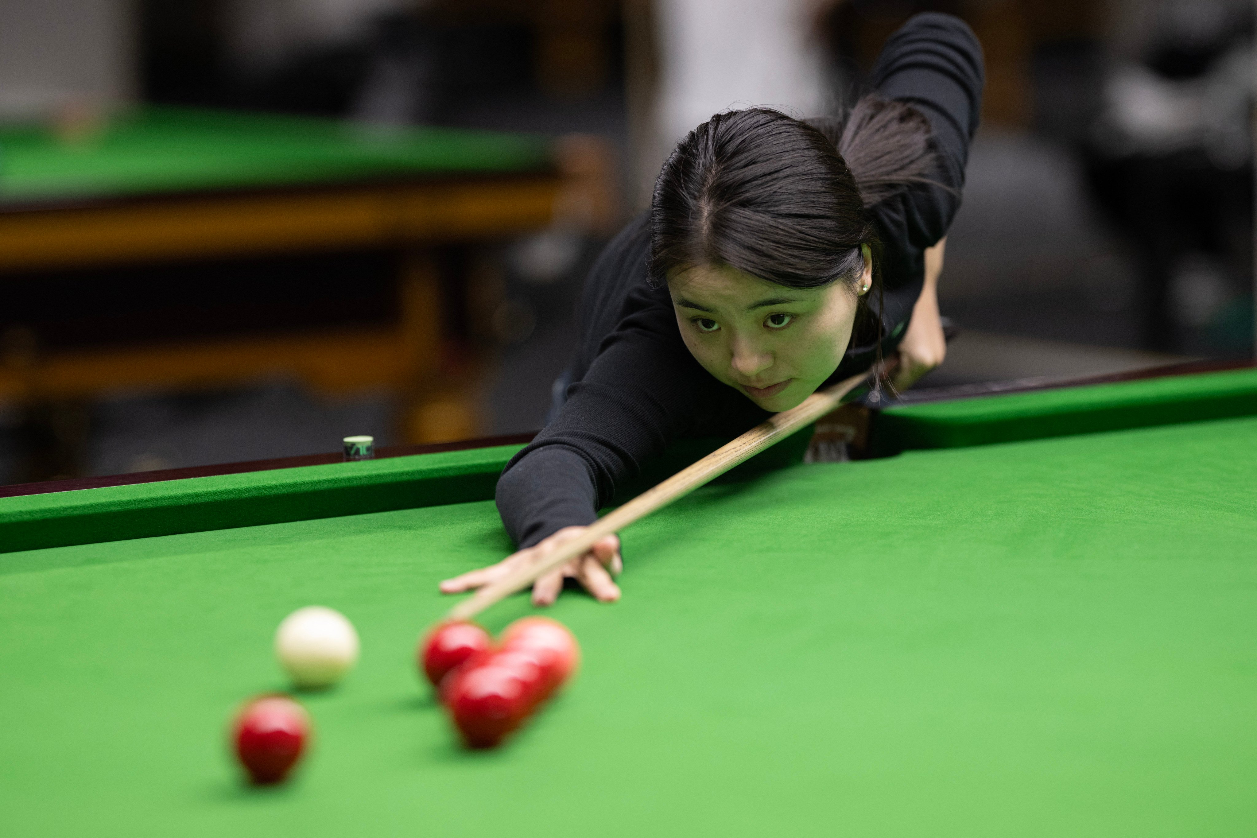 Bai Yulu says she trained 8-10 hours daily during her childhood and still trains rigorously today as a world champion. Photo: AFP