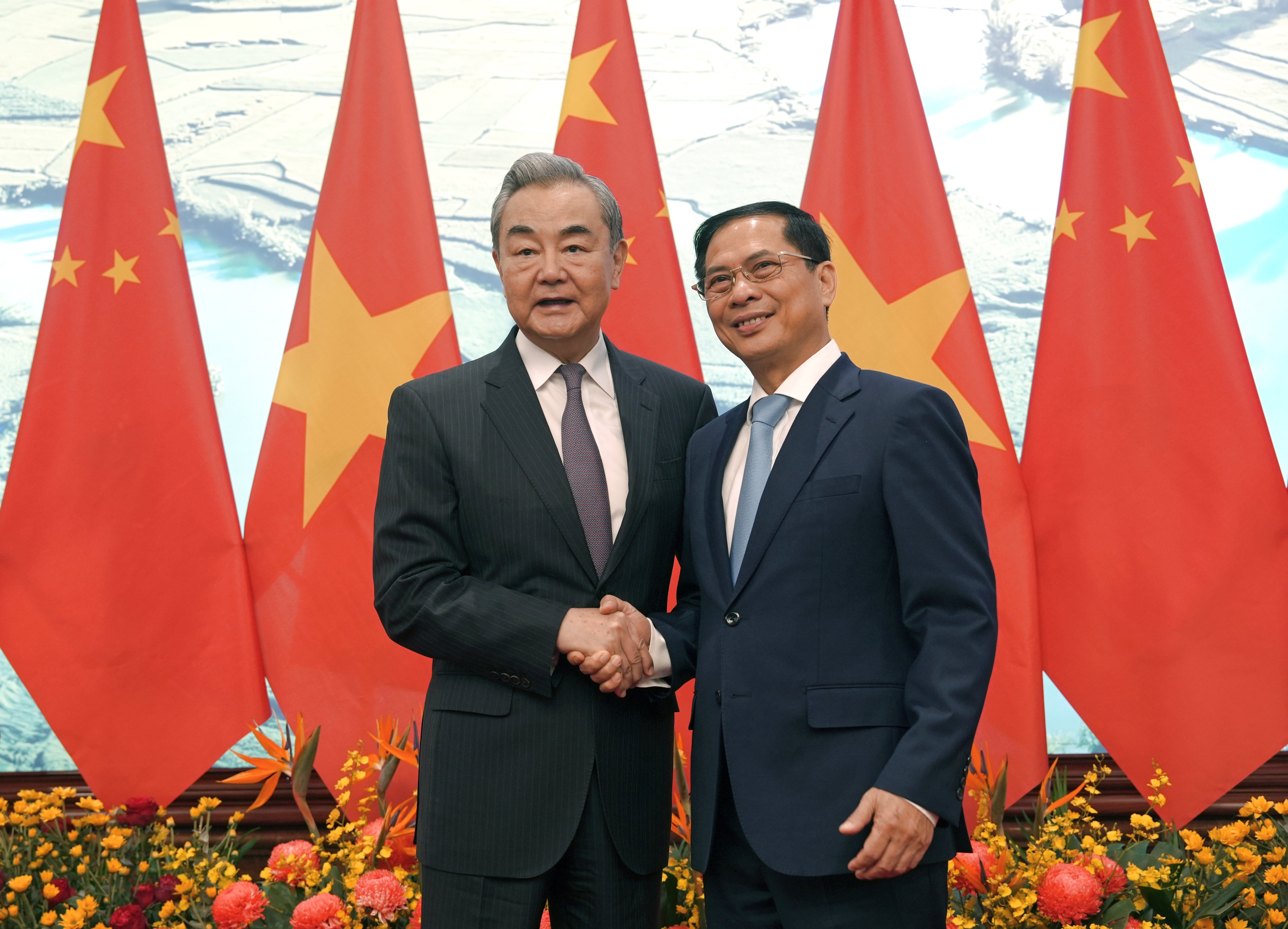 Chinese Foreign Minister Wang Yi with Vietnamese counterpart Bui Thanh Son, in Hanoi on March 17. They co-chaired a meeting on bilateral cooperation. Photo: Xinhua